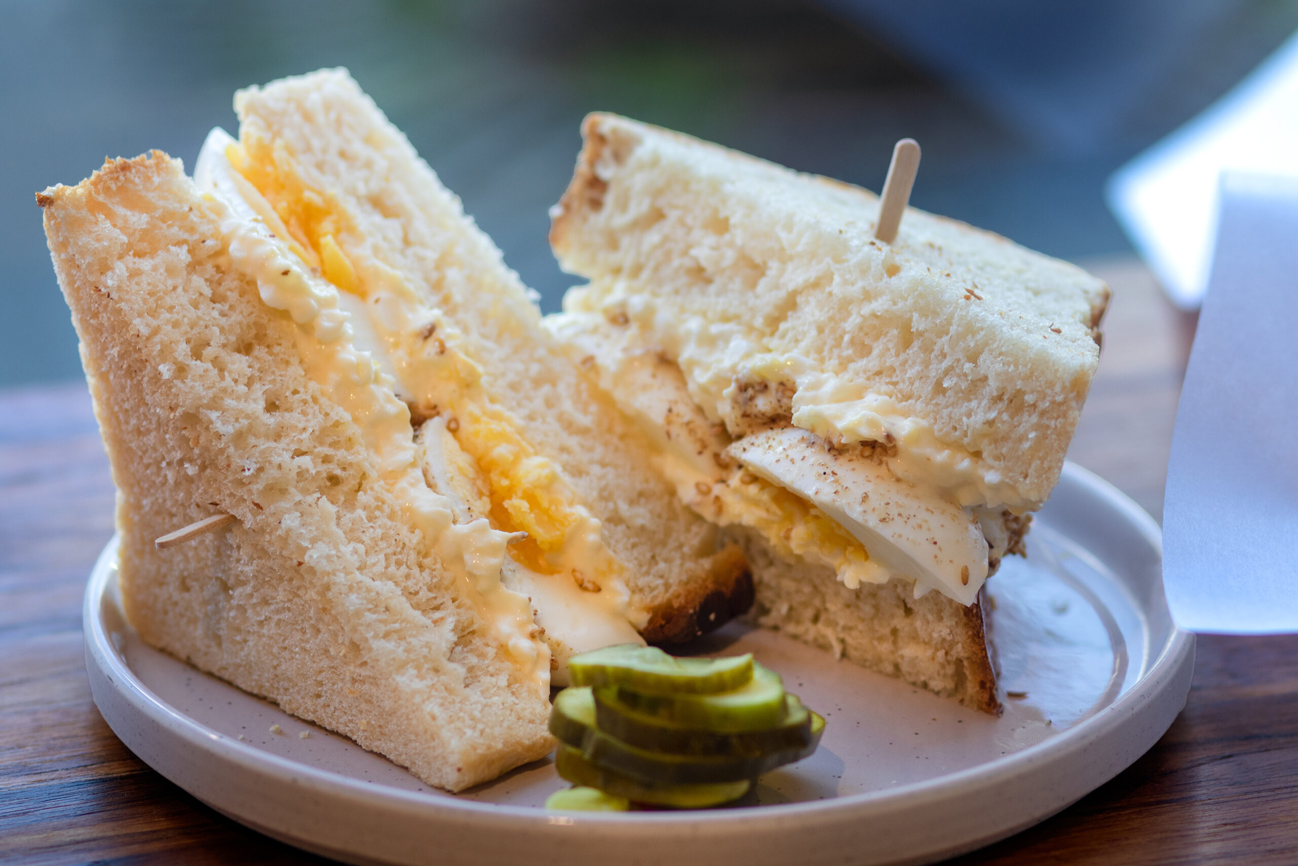 The new Troubadour sandwich shop from the owners of Quail & Condor is currently serving an egg salad sandwich that might be enough for two, with Japanese-style milk bread leavened with croissant trimmings, then mixed with buttermilk and toasted milk powder for a sweet, indulgent sandwich just asking for bites that are more face-plant than nibble. (Heather Irwin/Sonoma Magazine)