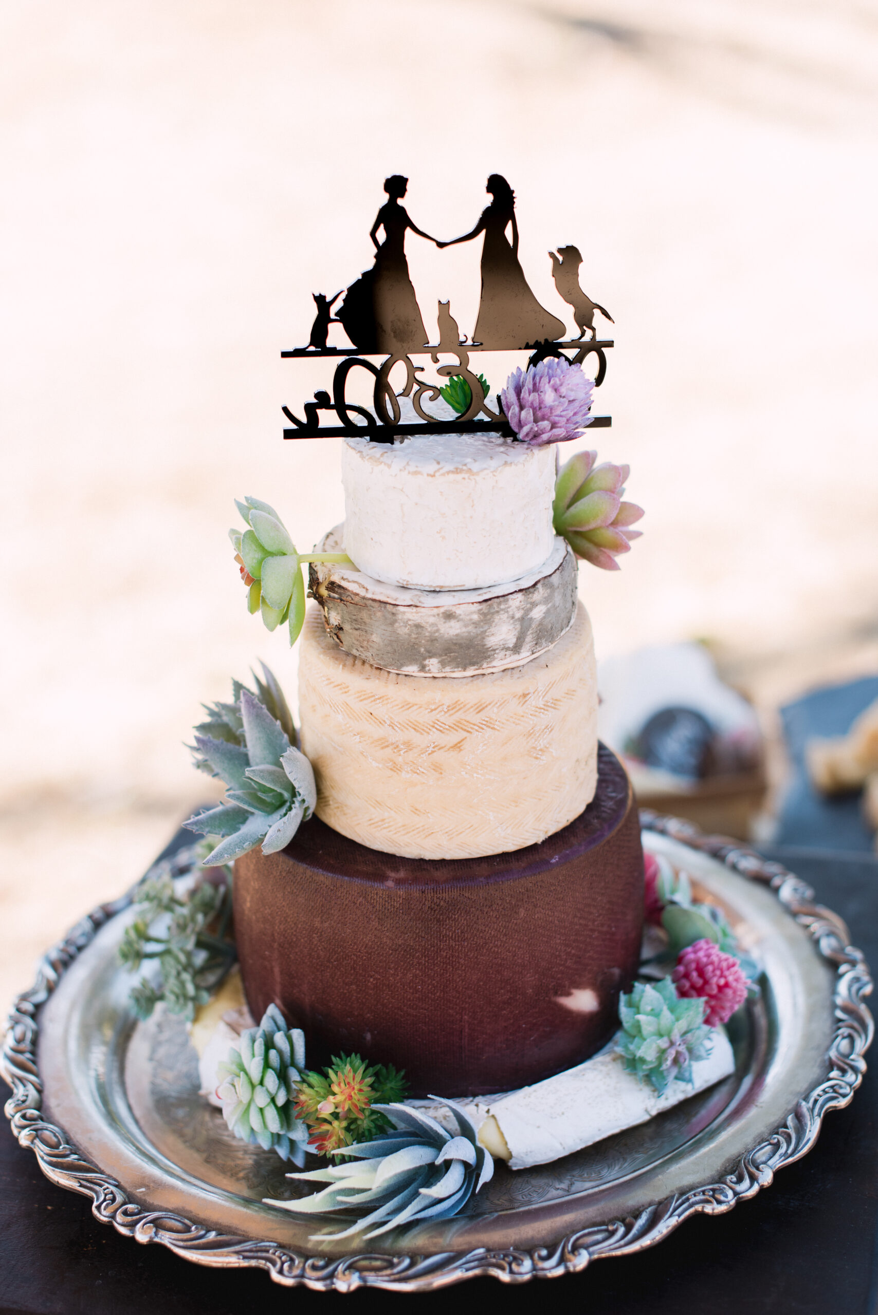 Wedding "cake" made of stacked cheese. (Photo by Rebecca Gosselin)