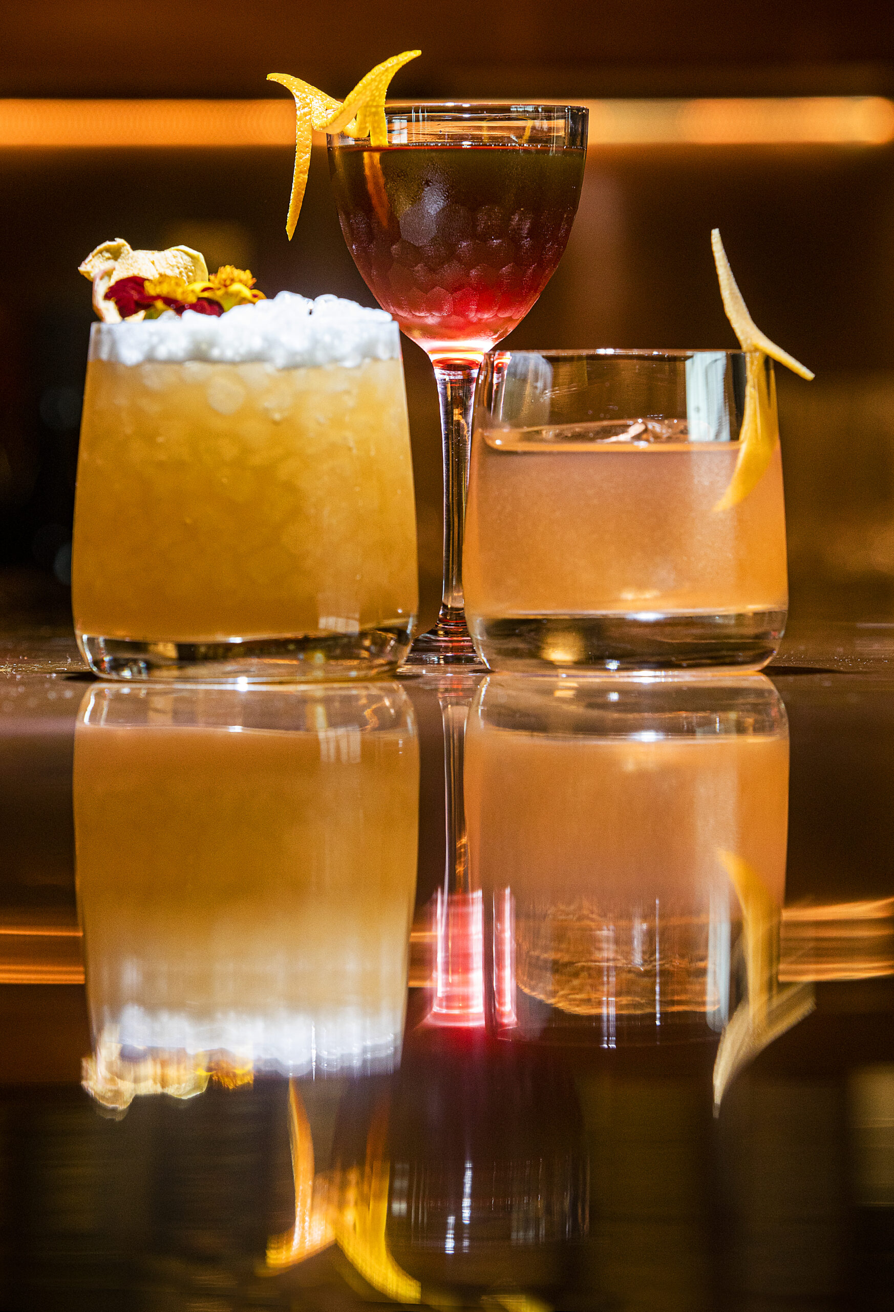 From left, Sherry Sunset, Into the Mine and Best's Bait cocktails from the rooftop bar at Roof 106 at The Matheson in Healdsburg on Friday, November 5, 2021. (Photo by John Burgess/The Press Democrat)