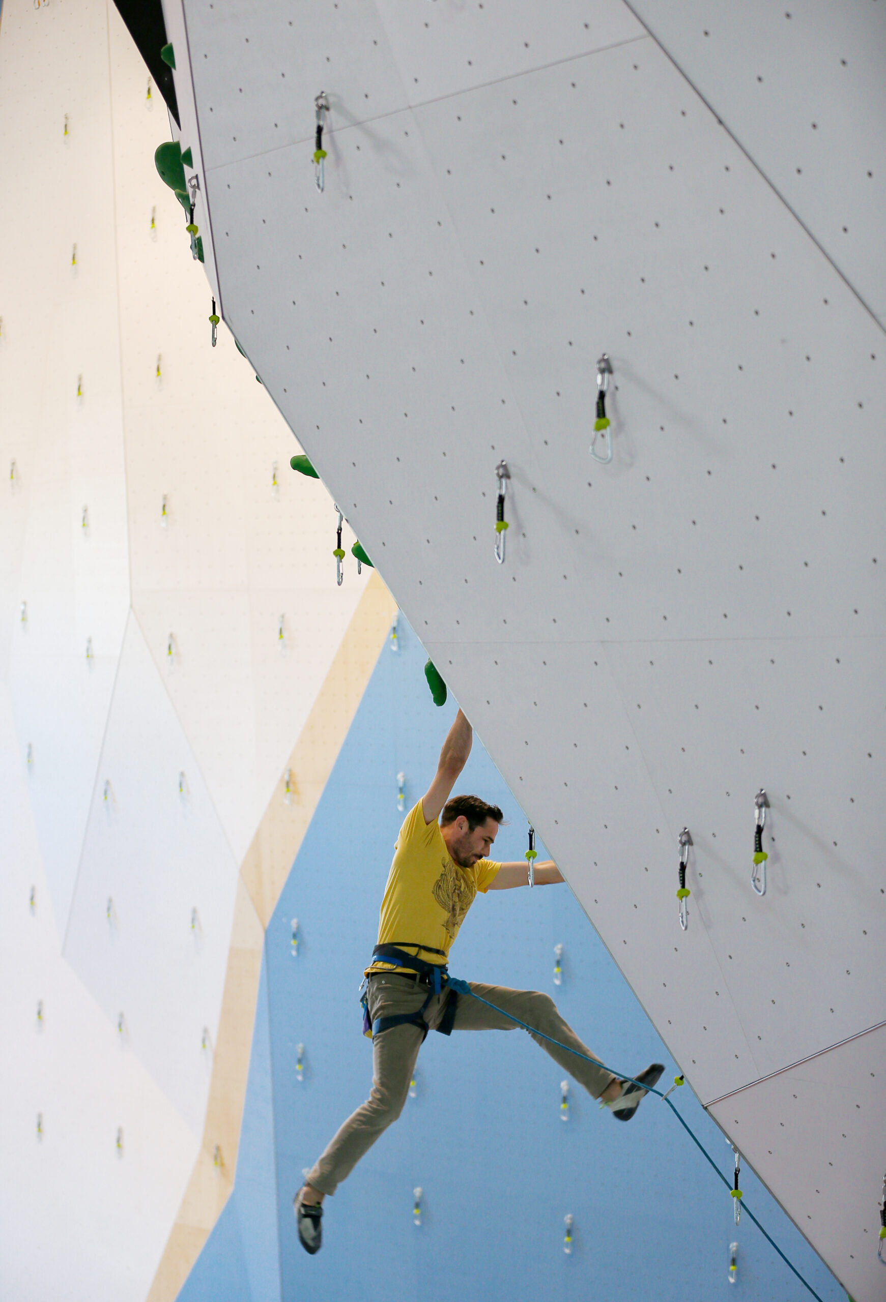 Kevin Jorgeson makes his way up a newly installed route at Session Climbing in Santa Rosa on Thursday, January 27, 2022. (Christopher Chung/The Press Democrat)