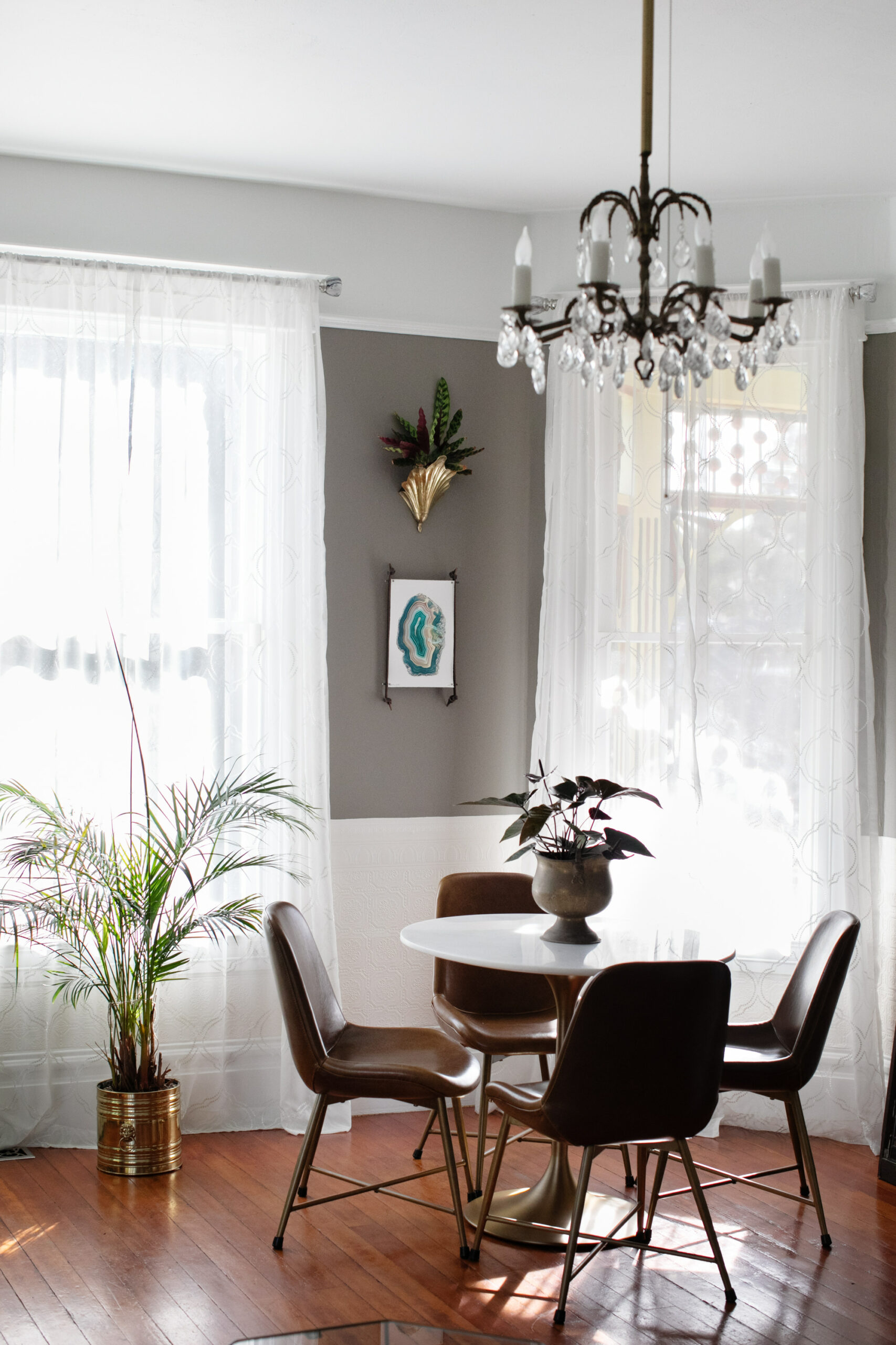 A small dining area, above, started with a mid-century table and chairs. (Eileen Roche/for Sonoma Magazine)