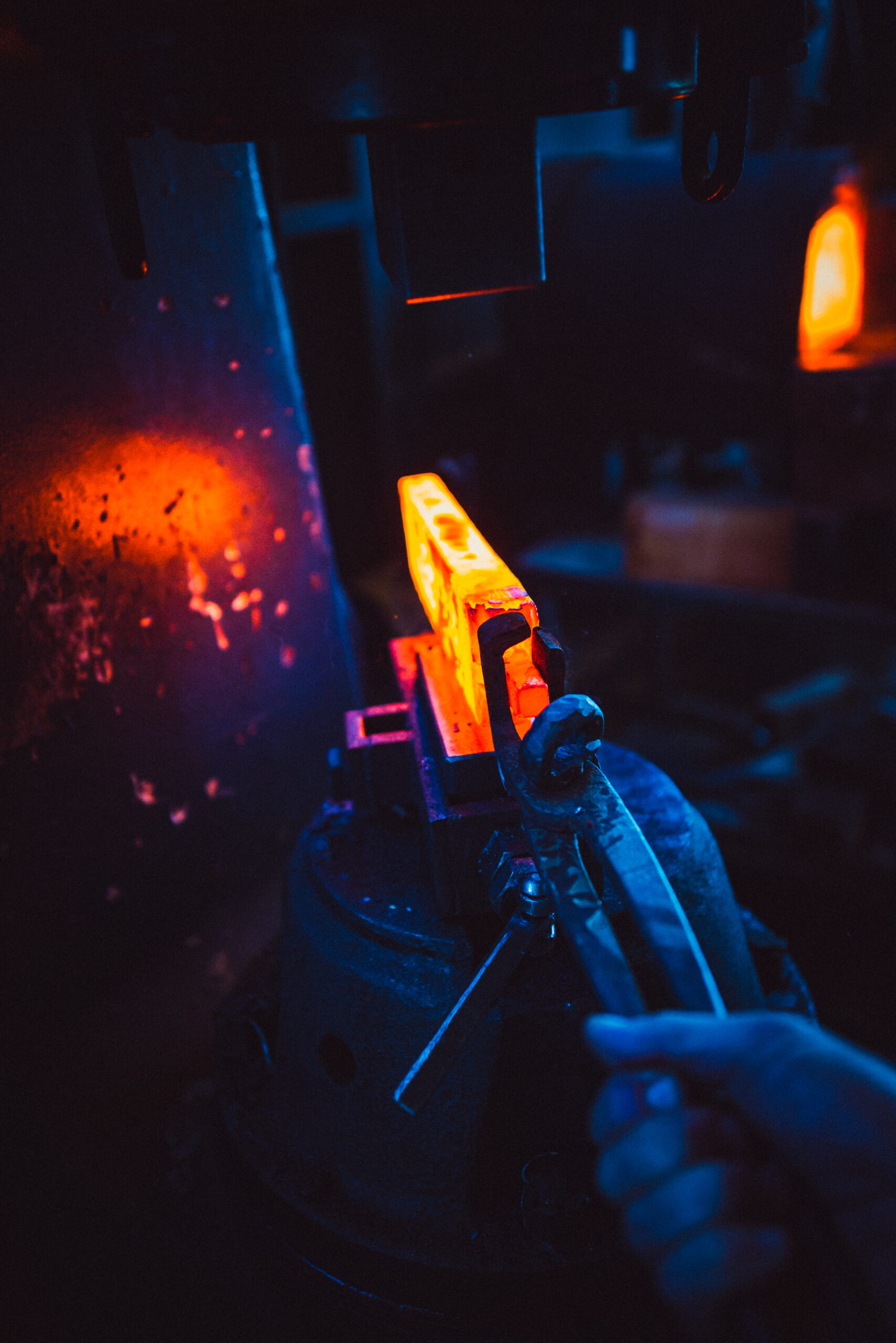 The grain on each blade comes from the fusing of two metals: a stainless steel outer “jacket” and a high-carbon core that can hold a sharp edge. (John Troxell)