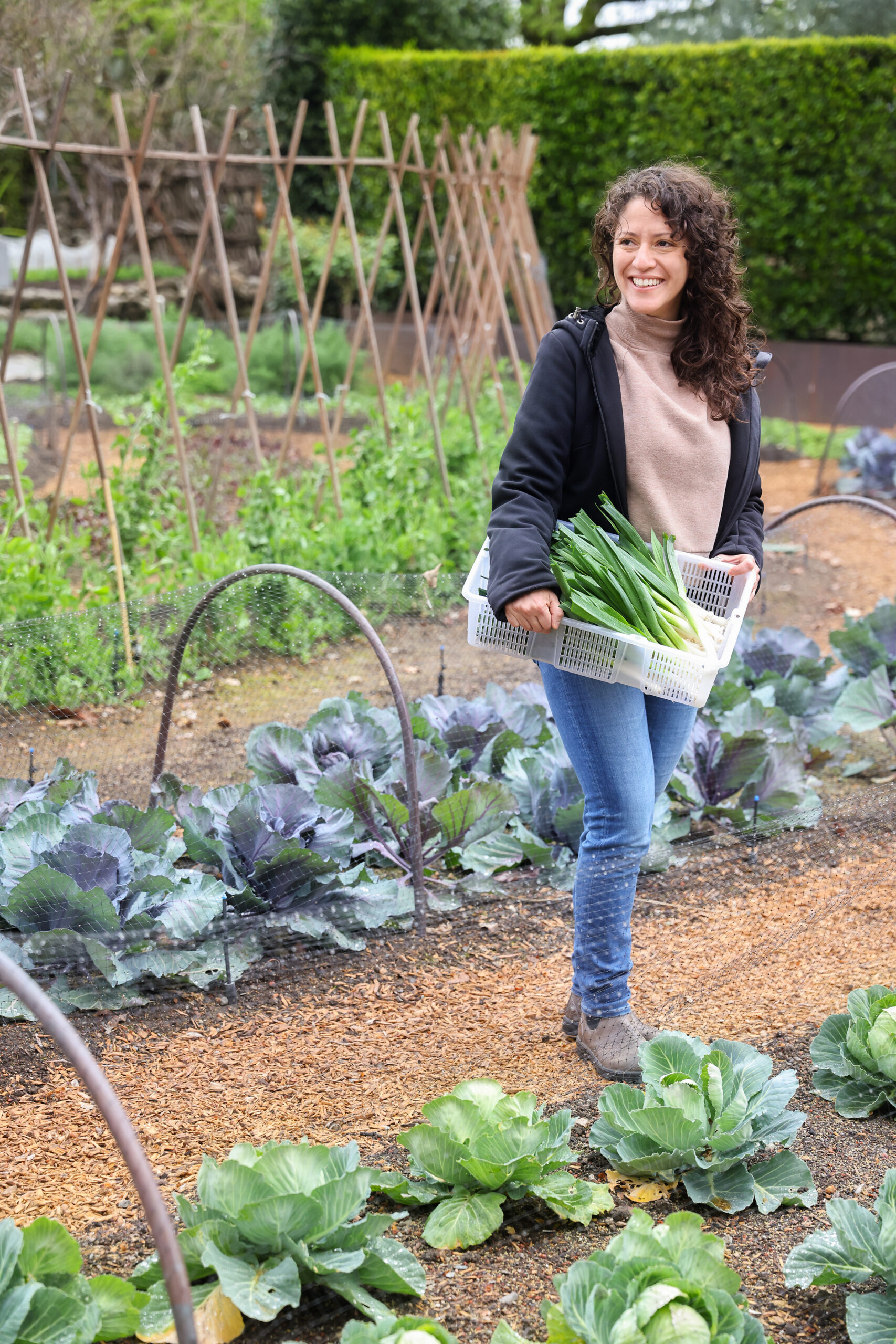 Fiorella Butron, culinary director and executive chef at EDGE, in the Stone Edge Farm culinary garden in Sonoma on Tuesday, March 15, 2022. (Christopher Chung/ The Press Democrat)