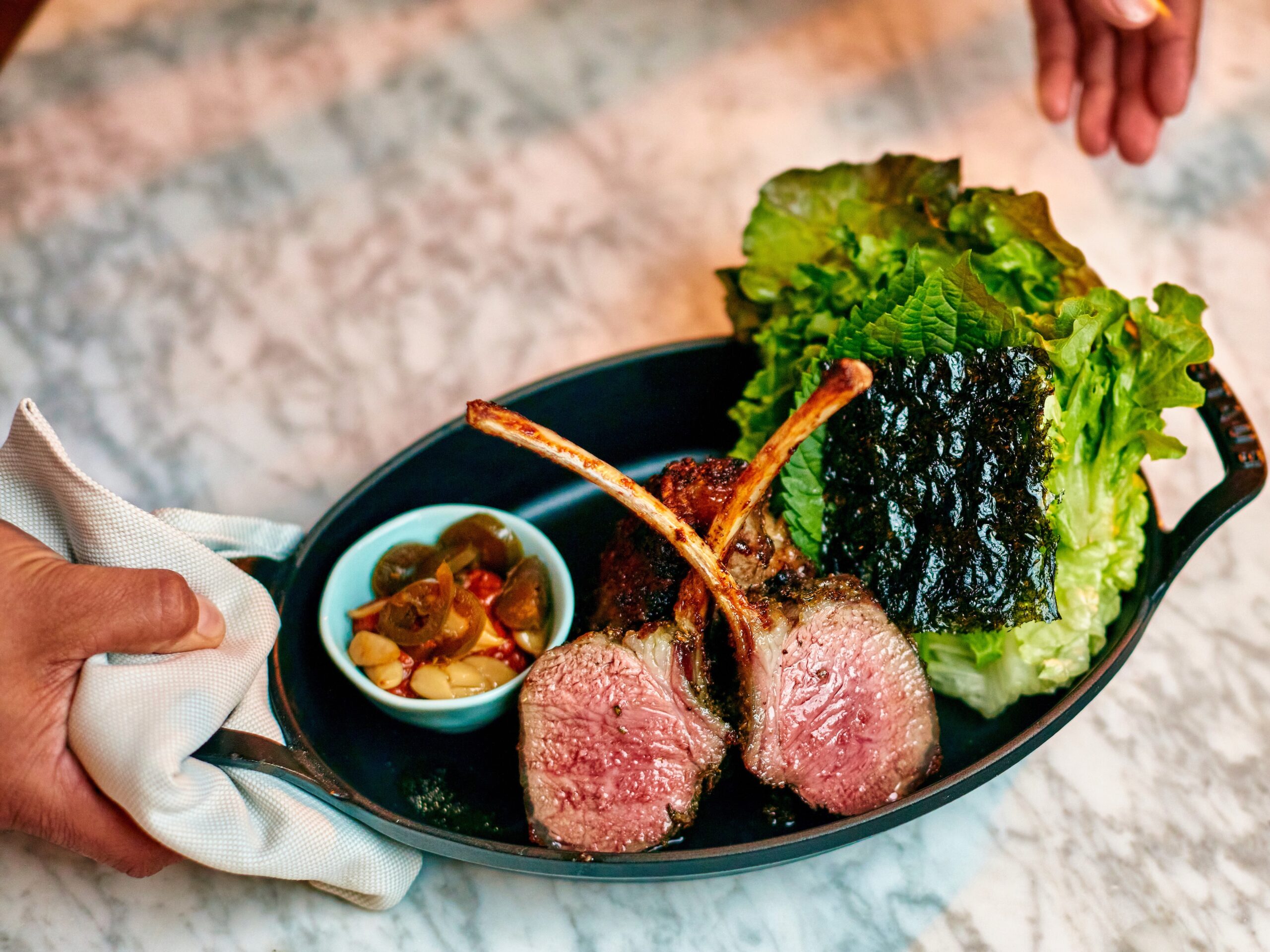 Lamb roasted over a live fire with shiso, nori, and housemade ssamjang at chef Joshua Smookler’s Animo. (Kim Carroll/for Sonoma Magazine)