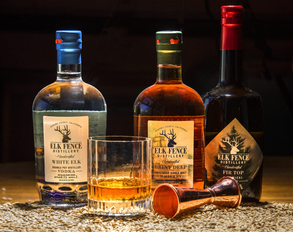 The Elk Fence Distillery produces, from left, White Elk Vodka, The Briny Deep Whiskey and Fir Top Gin in the only distillery in Santa Rosa. (John Burgess / The Press Democrat)