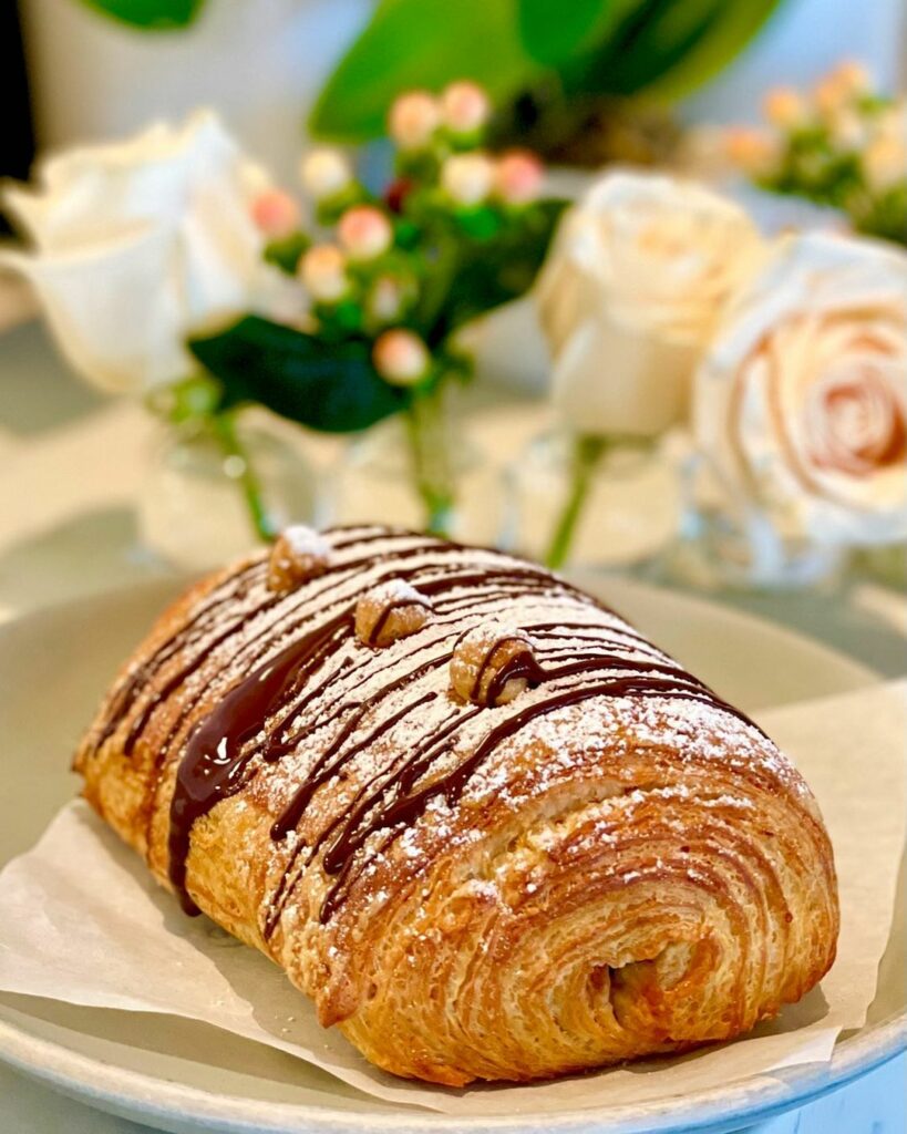 Nutella cornetto filled with the creamy chocolate and hazelnut spread, drizzled with chocolate ganache, and topped with whole toasted hazelnuts, at Stellina Pronto. (Courtesy Stellina Pronto)