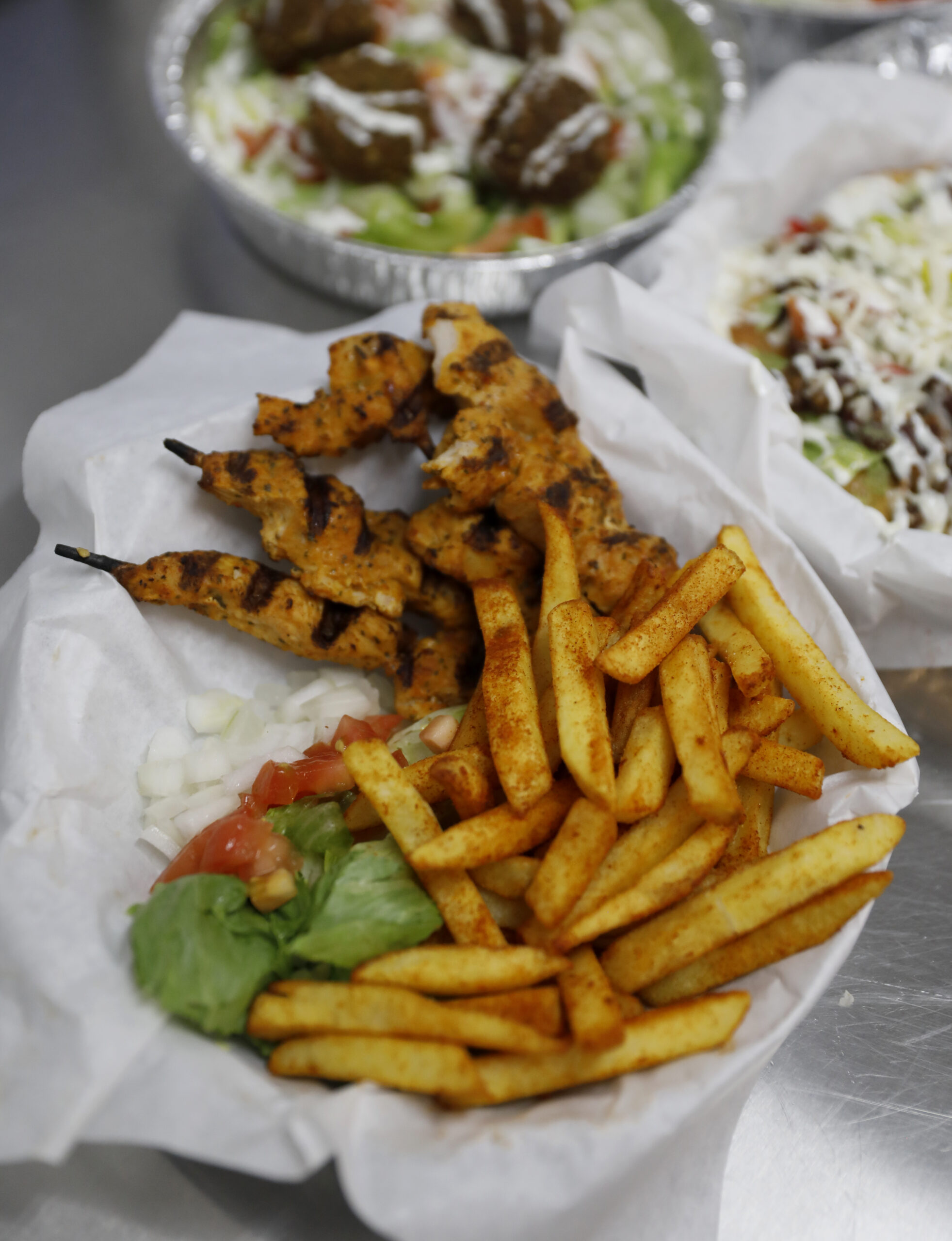 The chicken kebab with seasoned fries at ZamZam in Santa Rosa, Calif. on Monday, July 25, 2022. (Beth Schlanker/The Press Democrat)