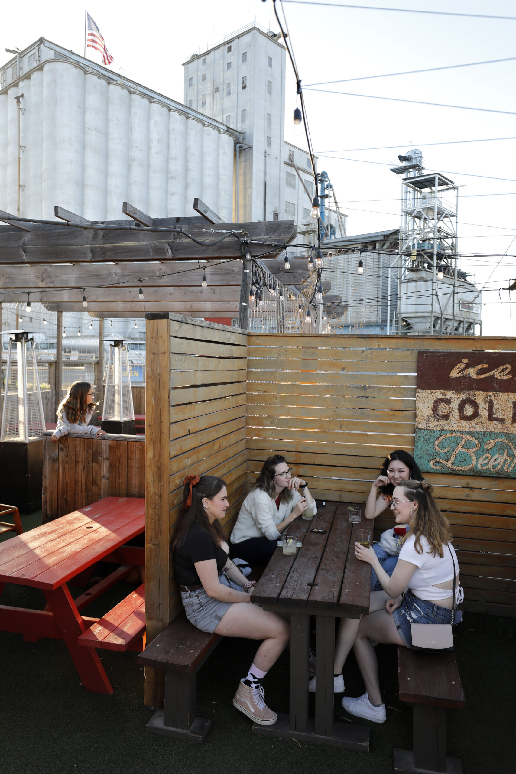 Sharing the summertime vibe at The Block in Petaluma. (Beth Schlanker/The Press Democrat)