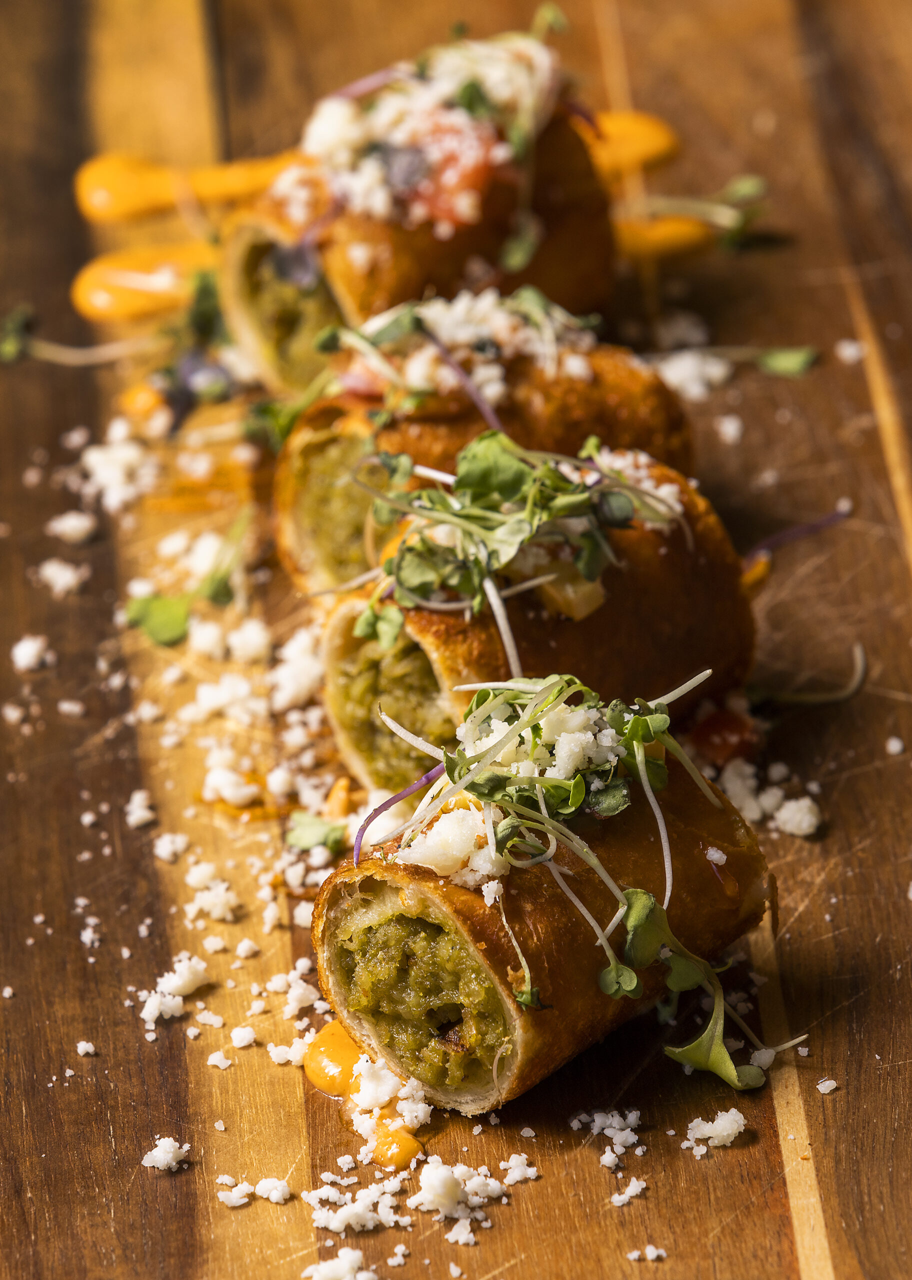 Chicken Chimichanga with mozzarella, cilantro rice, cotija cheese, grilled corn, pico de Gallo and chipotle aioli from Kinas Kitchen & Bar in Sonoma. (John Burgess / The Press Democrat)