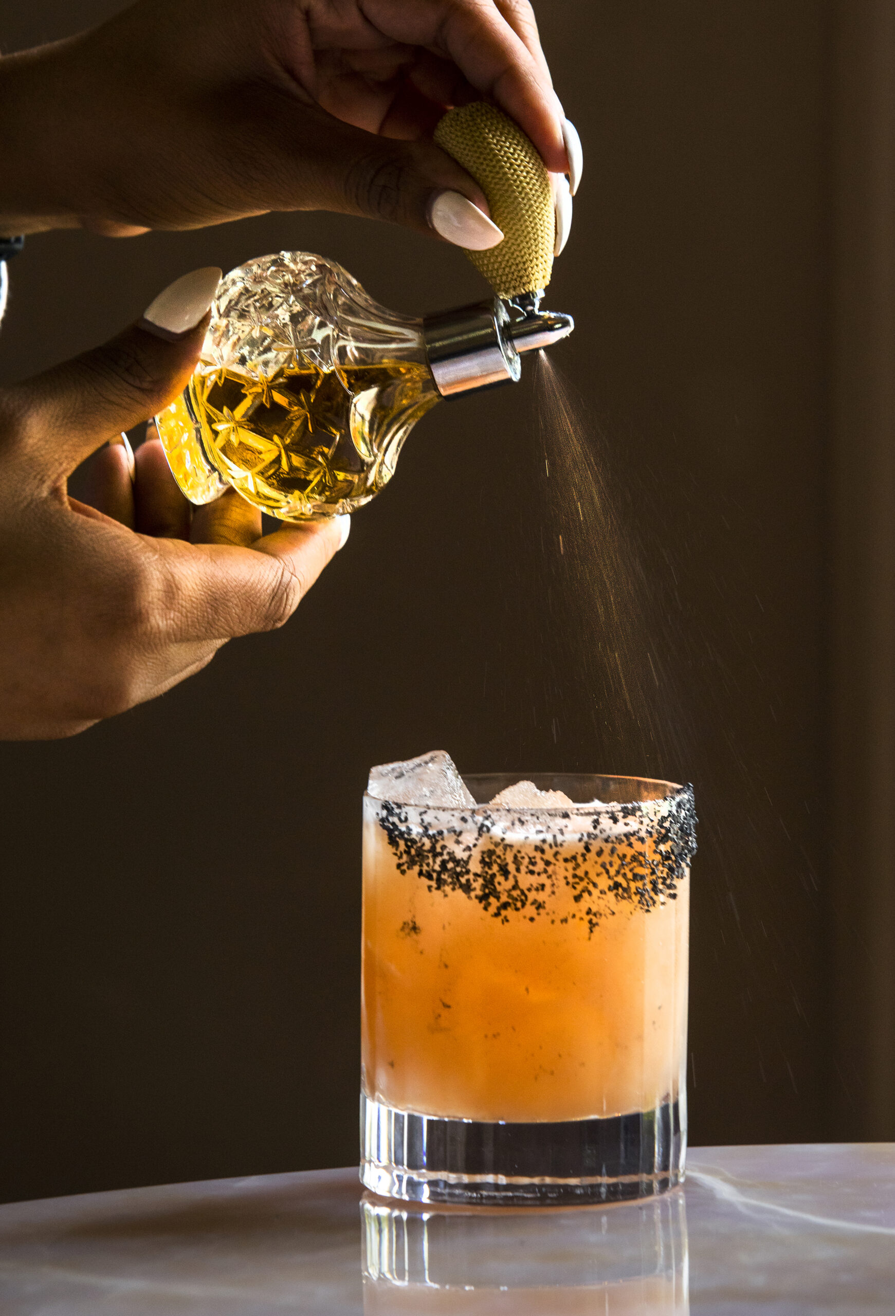 The Guava Sour with St. George Citrus Vodka, guava nectar, lime, estate orange oleo, Lillet, Black Salt and a mist of Absinthe from Hannah’s Bar at the Madrona Healdsburg Friday, June 3, 2022. (John Burgess / The Press Democrat)