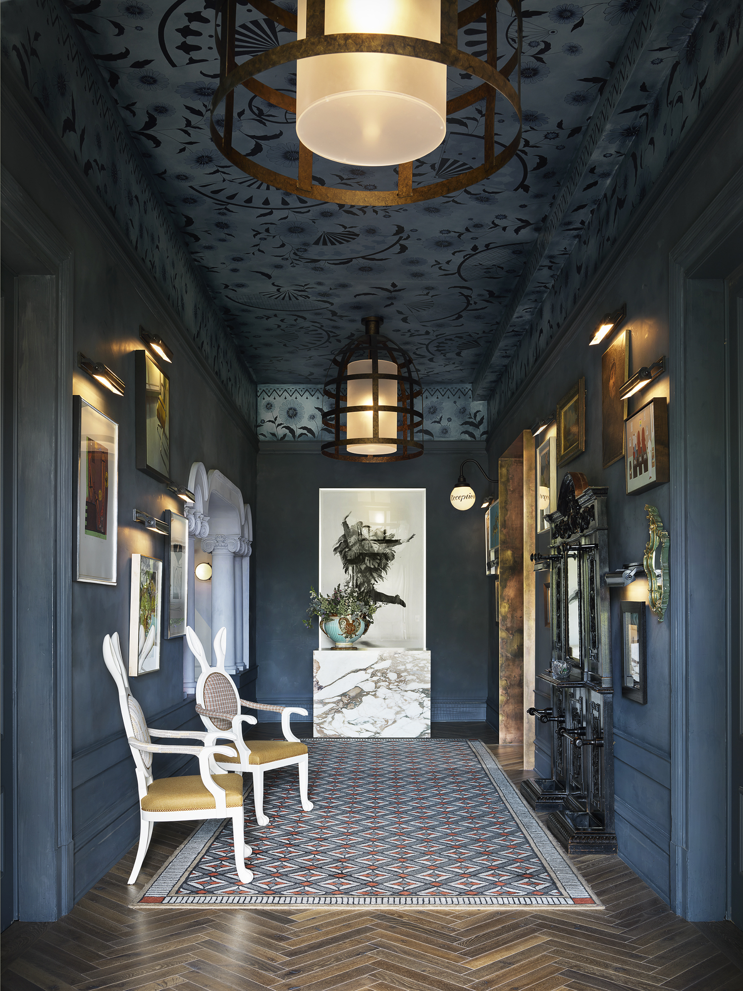 The dramatic entry features an artist-crafted ceiling and rug. (Matthew Millmann)