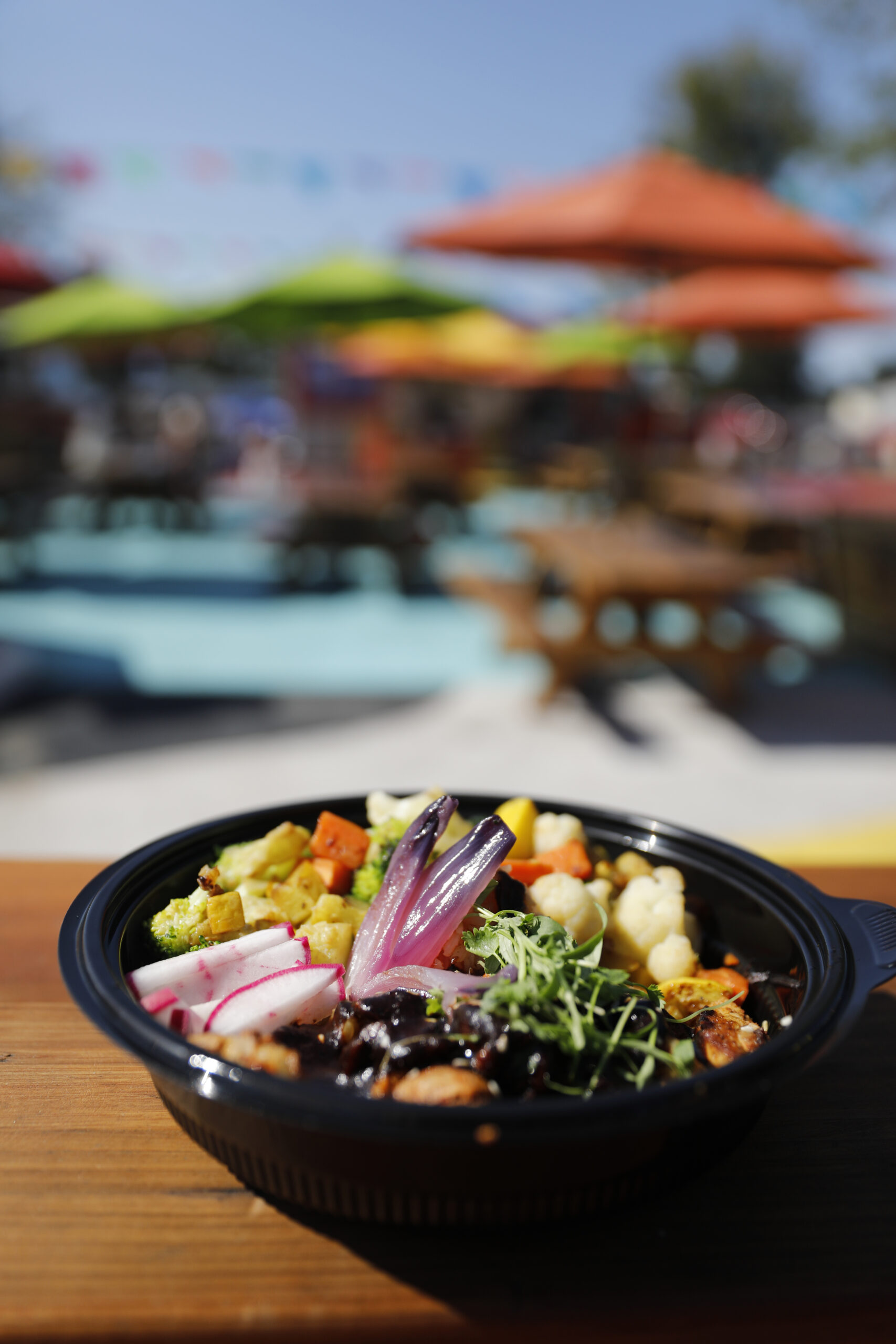 Chicken, vegetables and rice with red mole from the Maria Machetes food truck at the Mitote Food Park in Santa Rosa, Calif. on Monday, July 25, 2022. (Beth Schlanker/The Press Democrat)
