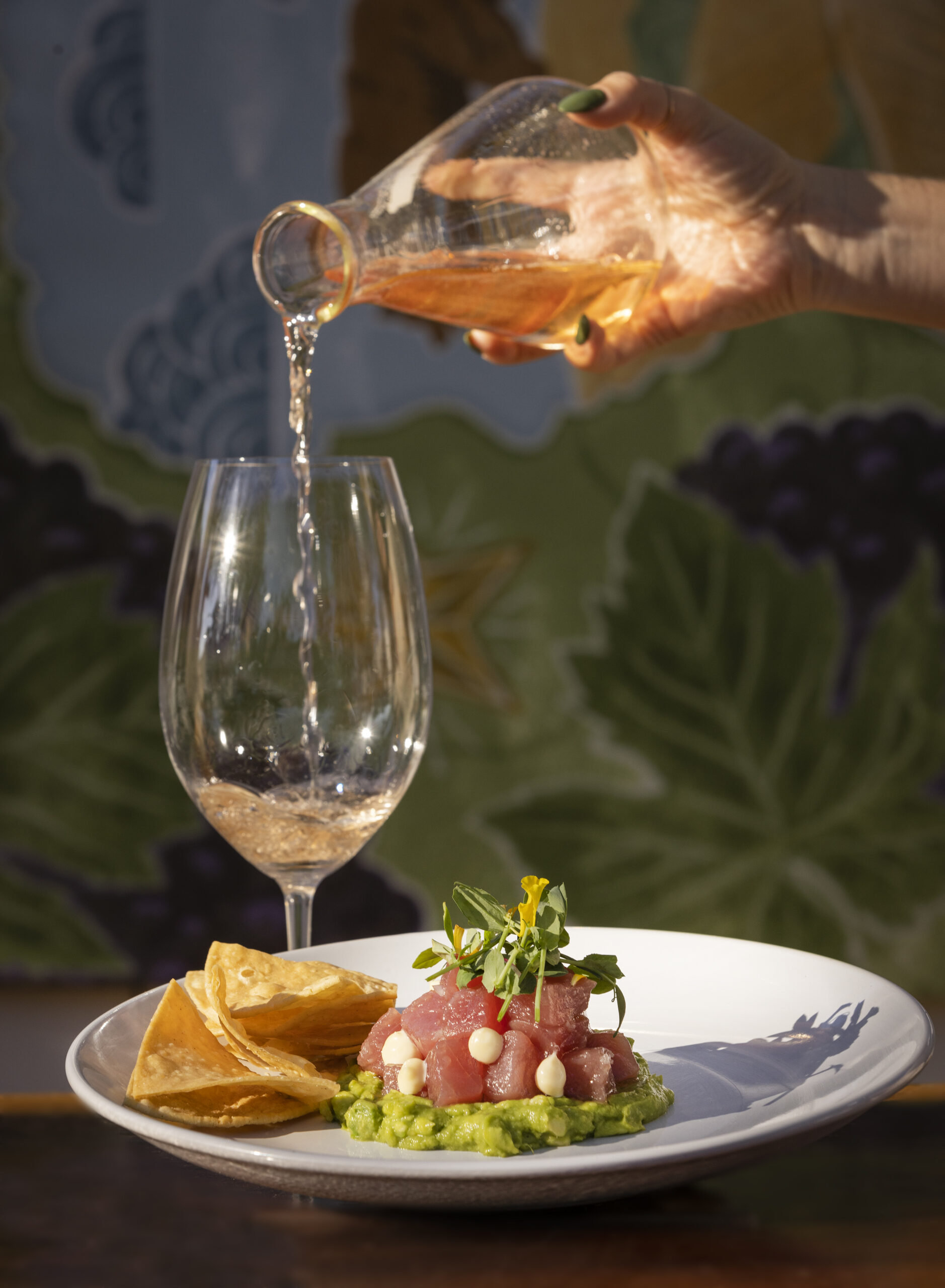 Sushi Grade Ahi Tuna with avocado, kewpie and served with chips from served with ÒTwice RemovedÓ Ros from the taps at Kivelstadt Cellars and WineGarten at the corner of Hwy 12 and Hwy 121 in Sonoma Thursday, October 20, 2022. (John Burgess/The Press Democrat)