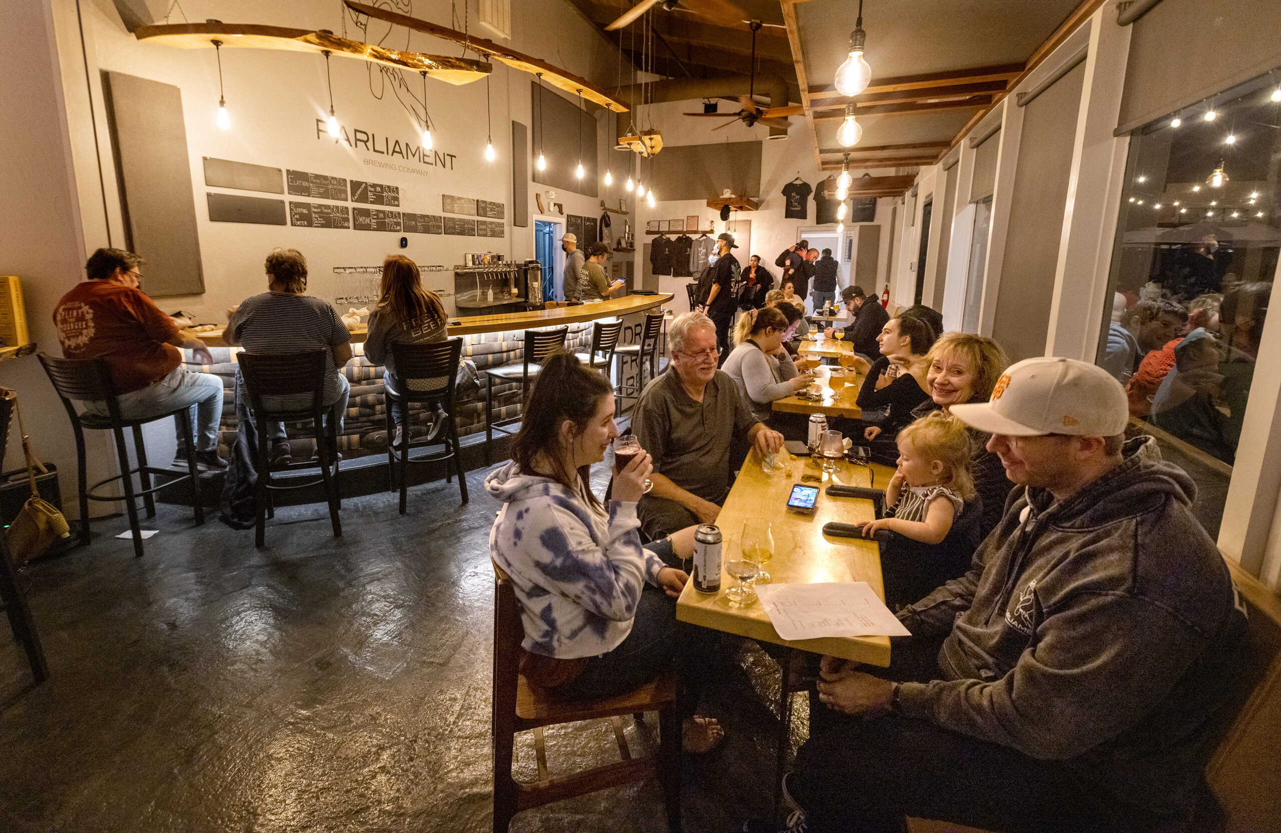 Fans of beer and trivia fill the seats on a Wednesday night at Parliament Brewing Company in Rohnert Park on February 15, 2022. (John Burgess/The Press Democrat)
