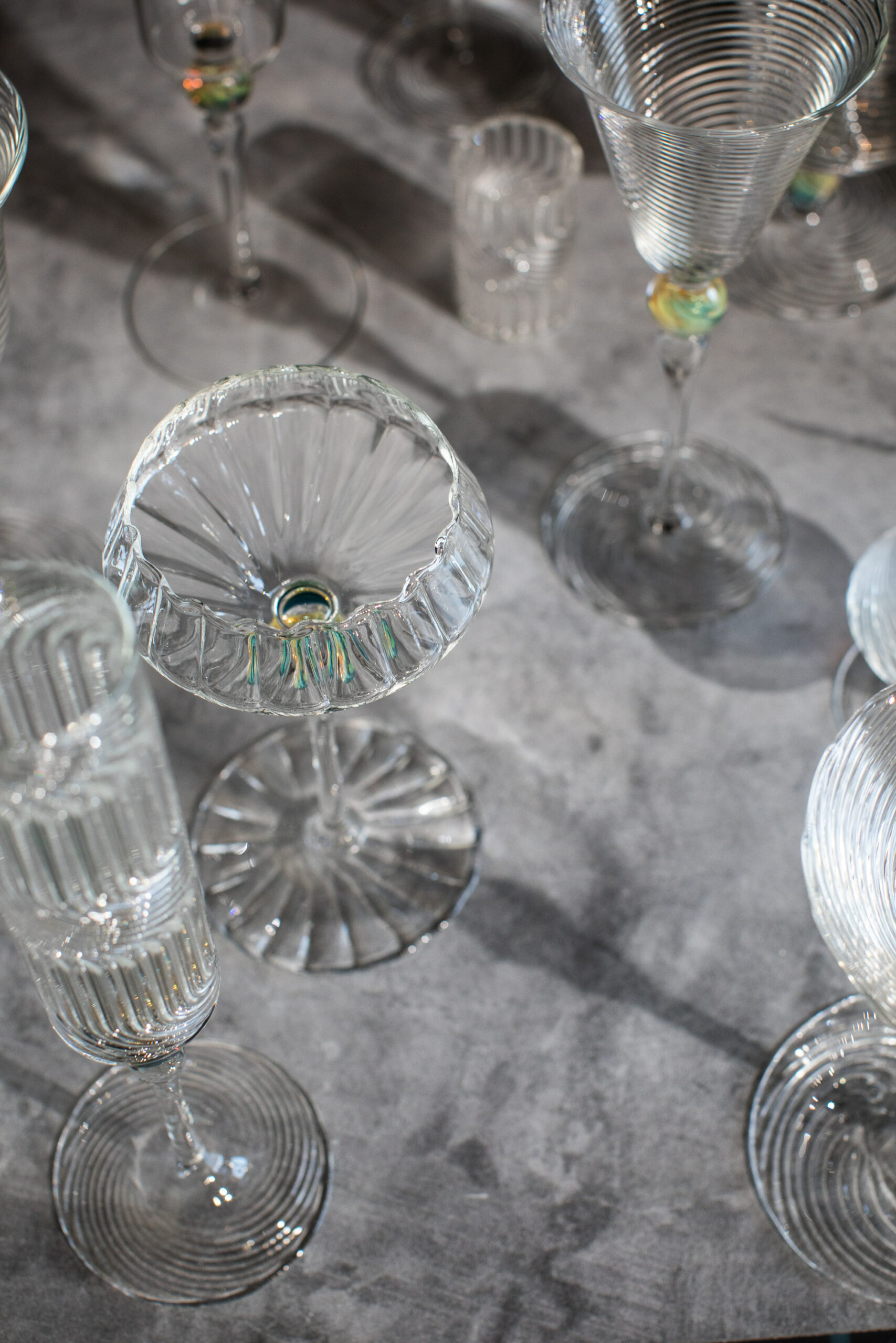 Delicate handblown champagne flutes and cordial glasses sparkle for the holiday. (Eileen Roche)