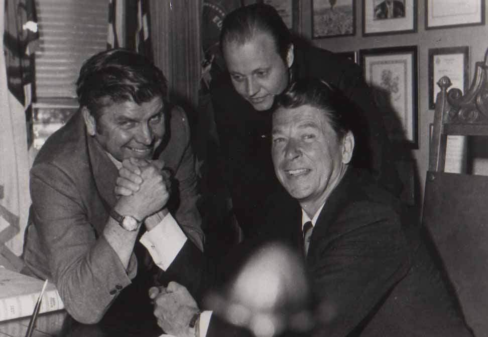 On Feb. 12, 1952, Petaluma's first wrist wrestling championship was held at Gilardi's bar, with a match between Oliver Kullberg, a Lakeville rancher, and Jack Homel, a major league baseball trainer. The competition grew to international proportions attracting celebrities and politicians from near and wide. In this photo then-Gov. Ronald Reagan wrestles Bill Soberanes at a later competition. (PETALUMA MUSEUM)