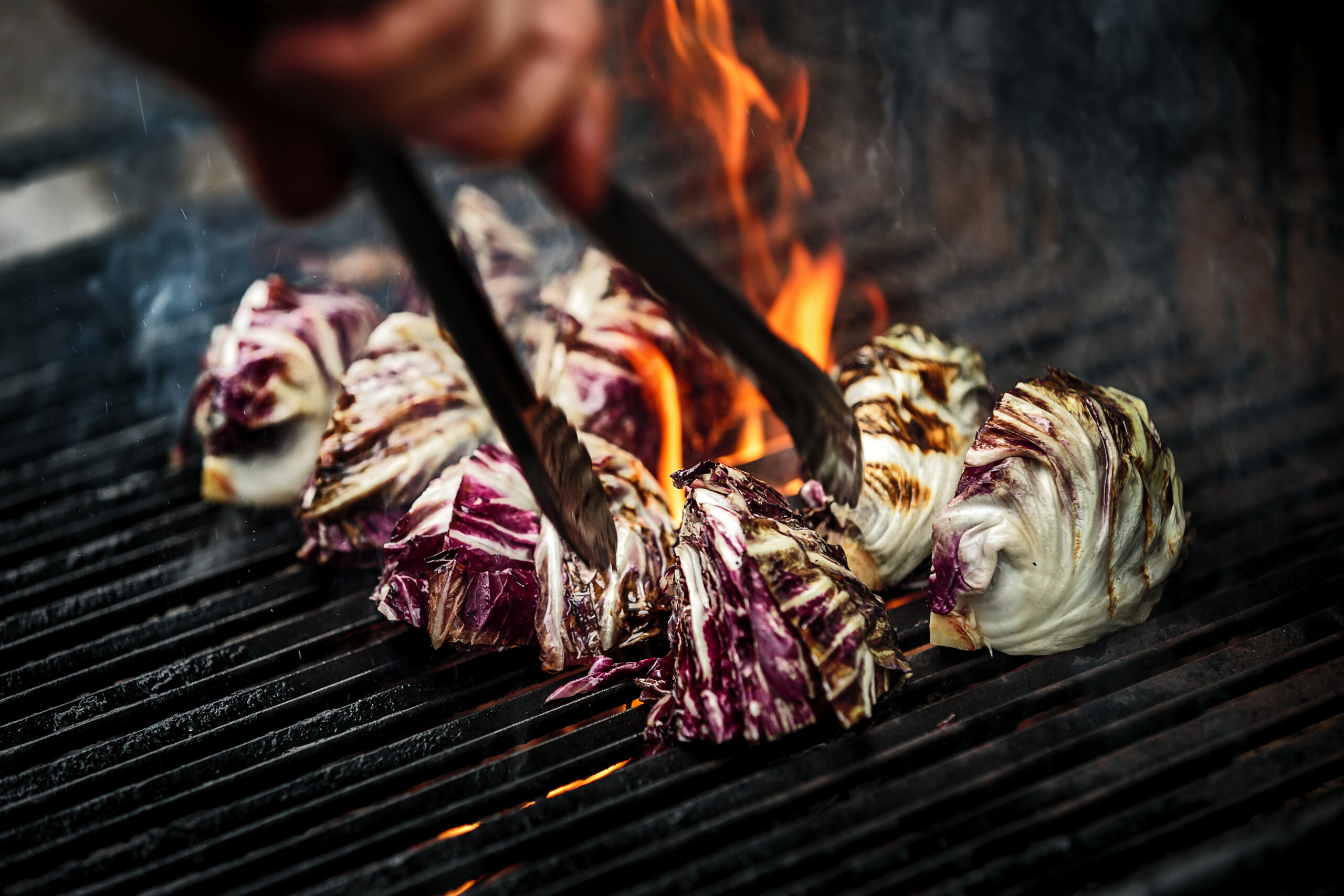 Grilling radicchio Dino Bugica, chef/owner of Diavola grilling vegetables