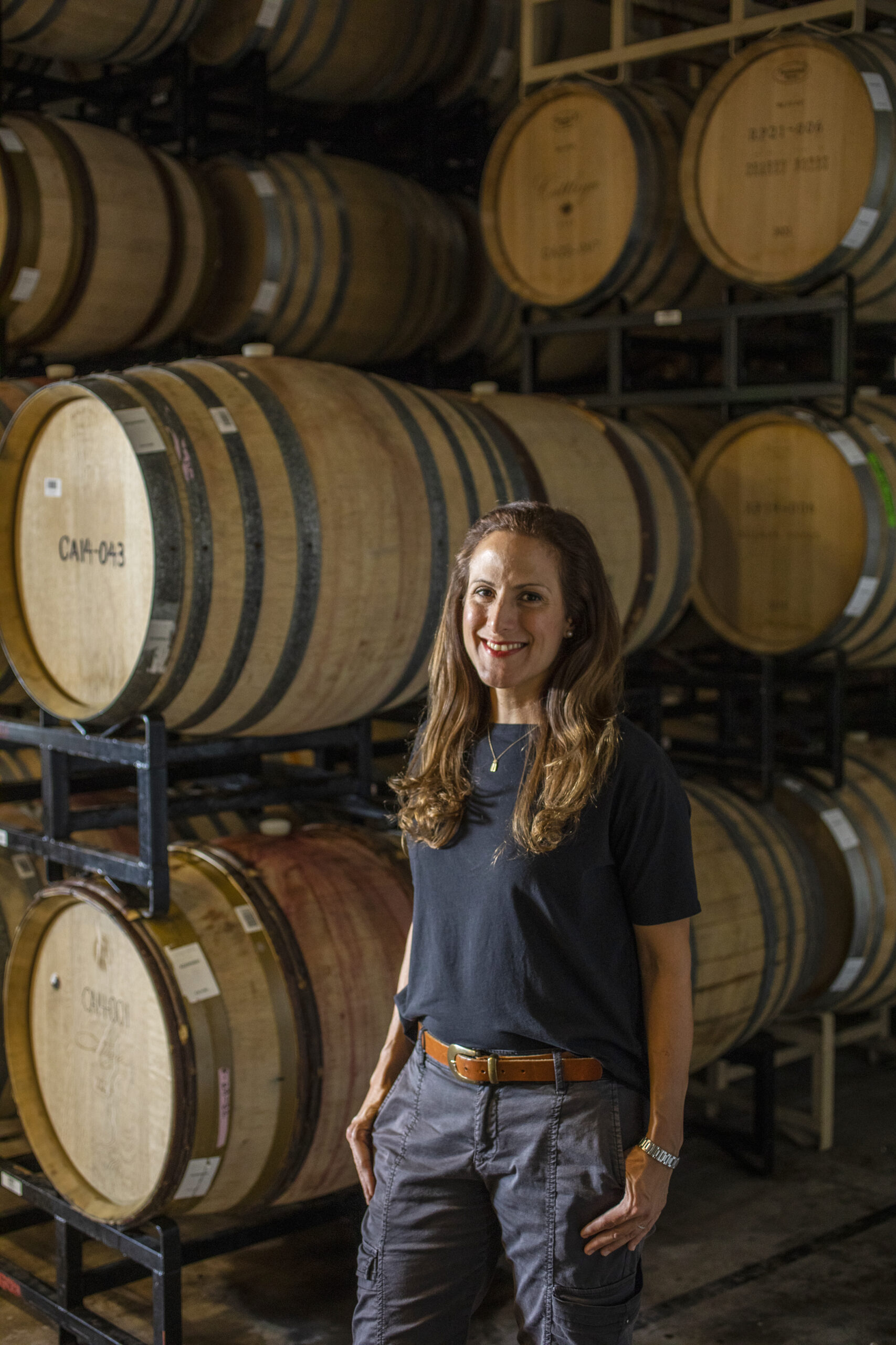 Winemaker Bibiana Gonzales Rave in the barrel room at the Pisoni wine production facility in Rohnert Park September 14, 2022. (Chad Surmick / The Press Democrat)