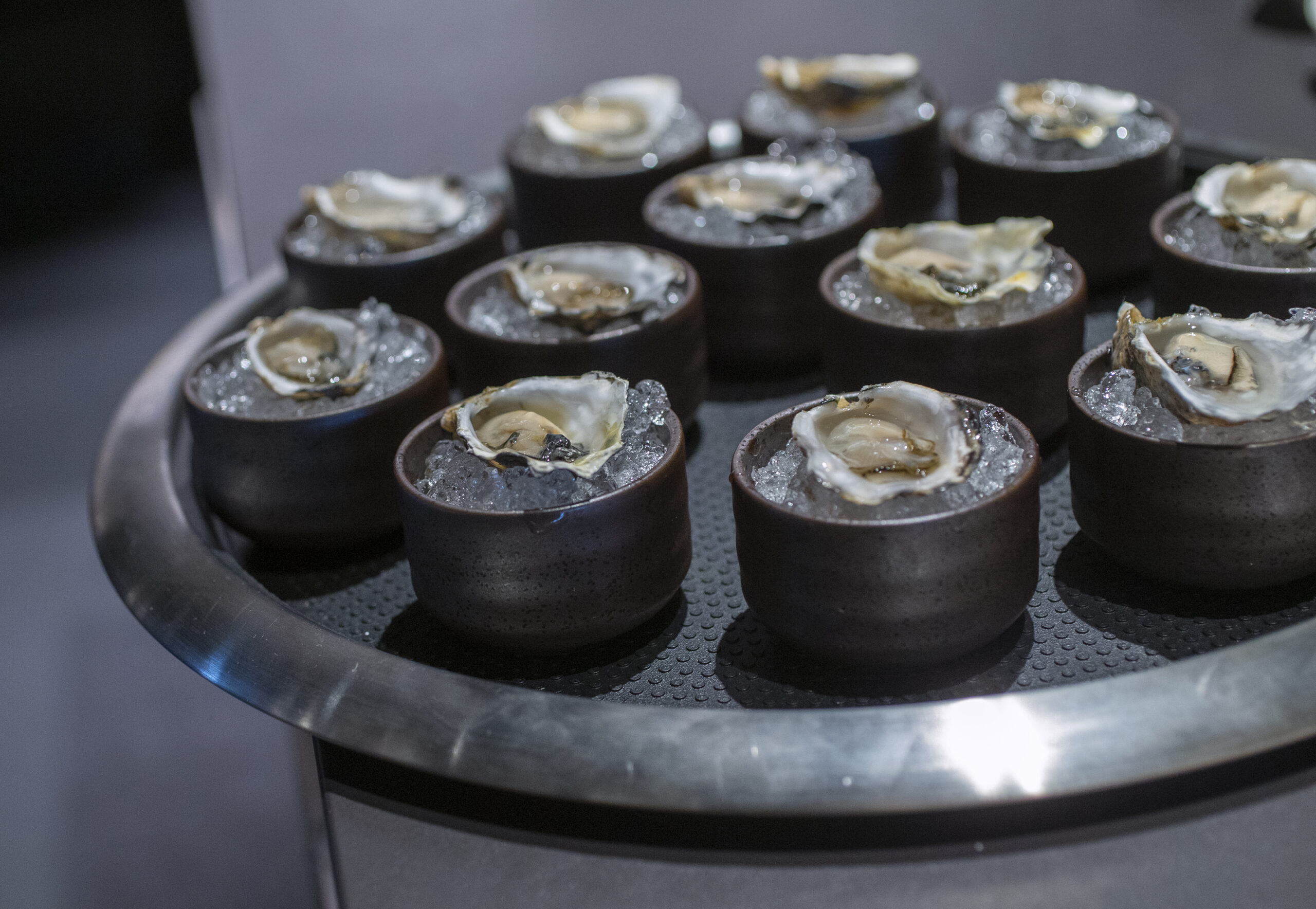 Sparkling wine and oysters in the bubble room at Cyrus in Geyserville. (Chad Surmick/The Press Democrat)