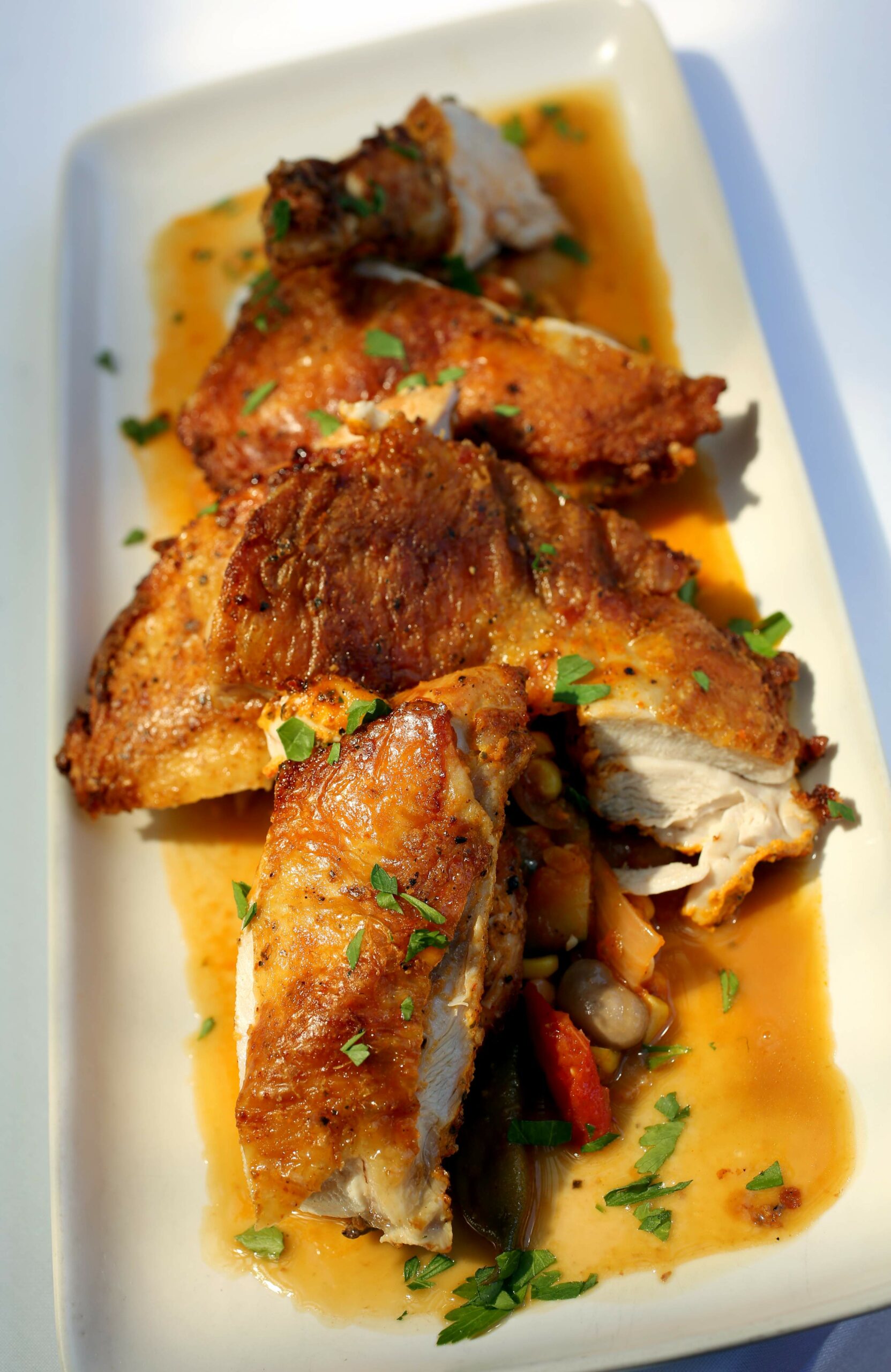 Pollo alls Diabola made at Bistro Don Giovanni restaurant in Napa, Friday, July 18, 2014. (Crista Jeremiason / The Press Democrat)