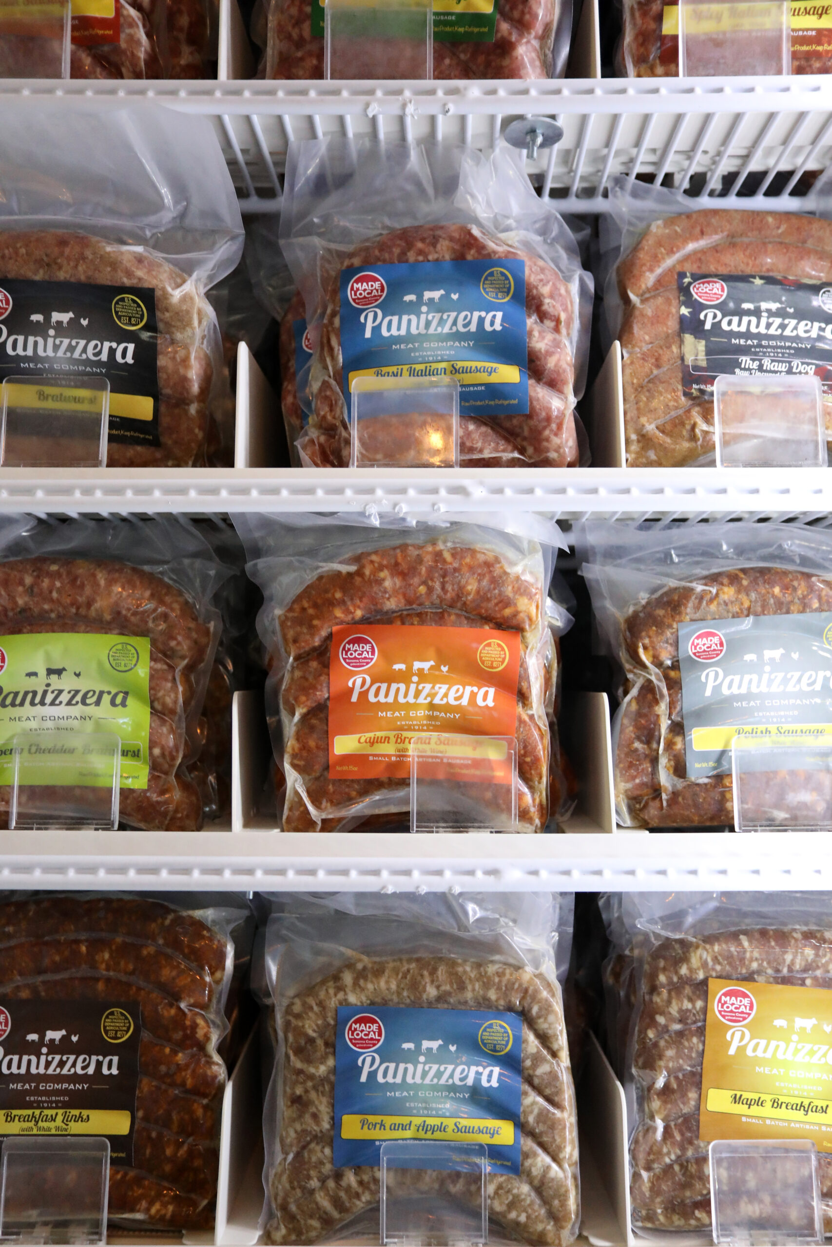 A variety of sausages are for sale at Panizzera Meat Co. in Occidental in 2021. Sustainably raised local meat is becoming more popular, produced locally by places like Panizzera. (Beth Schlanker/The Press Democrat)