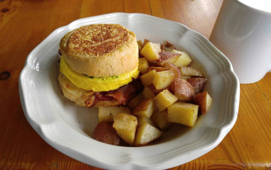 Bacon Bandit with bacon, white cheddar, arugula pesto, lemon curd and a baked egg at Criminal Baking Co. (Facebook)