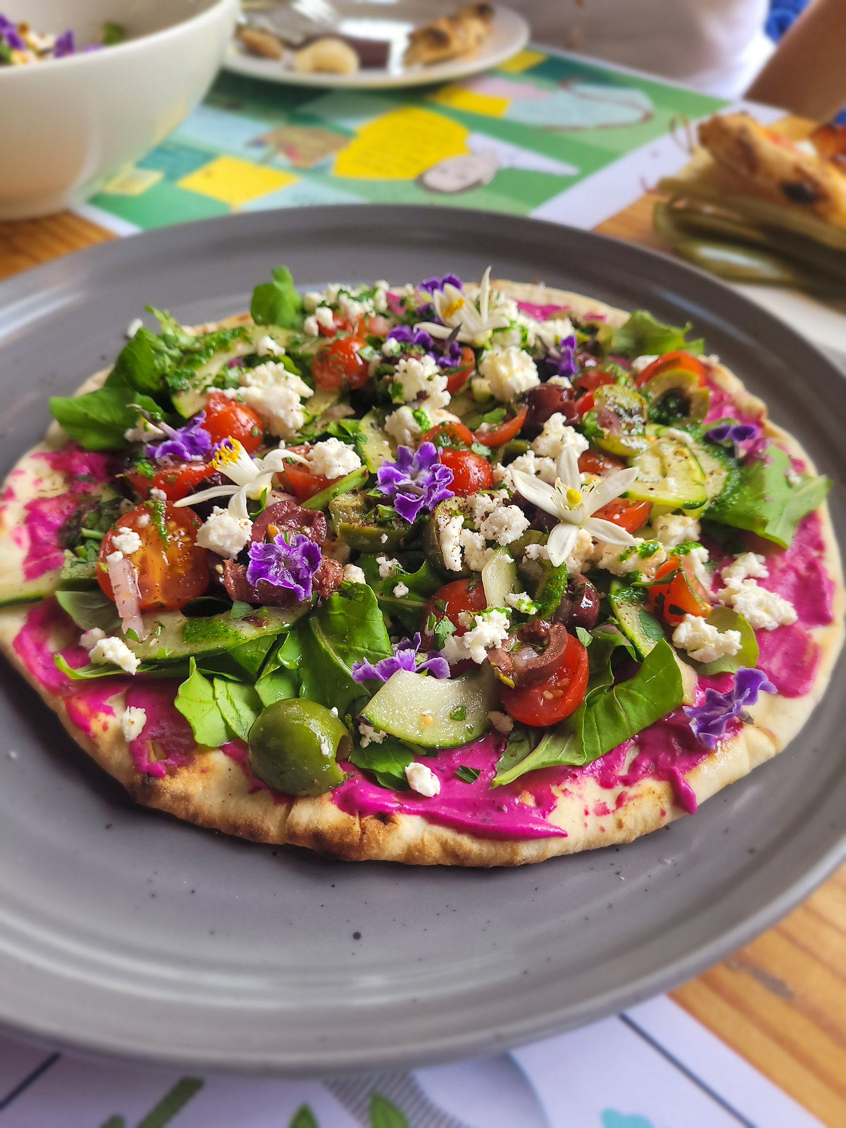 Lemon Beet Hummus Flatbread at Flora's Field Kitchen in Los Cabos. (Heather Irwin/The Press Democrat)