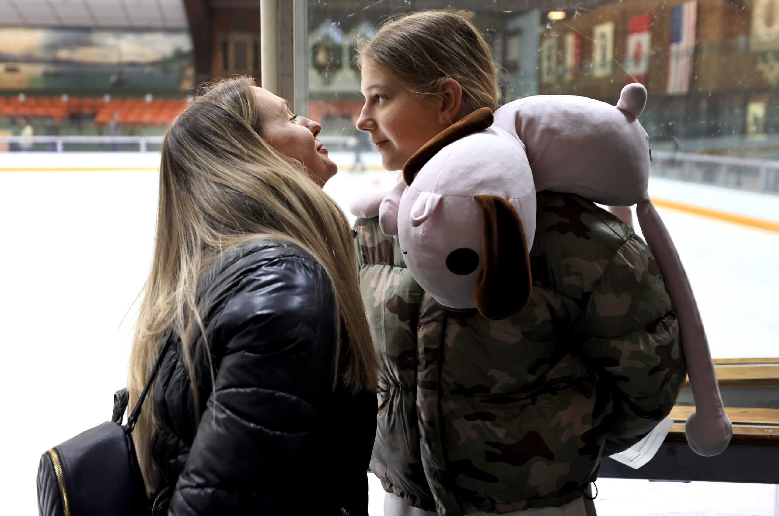 Ukrainians Anna Tereshenko and daughter Yeva Perepechaieva, 12, share a quiet moment after Perepechaiev an ice skating lesson at SnoopyÕs Home Ice, Thursday, Nov. 17, 2022 in Santa Rosa. Tereshenko and Perepechaieva fled the Dnipro region of eastern Ukraine. (Kent Porter / The Press Democrat) 2022