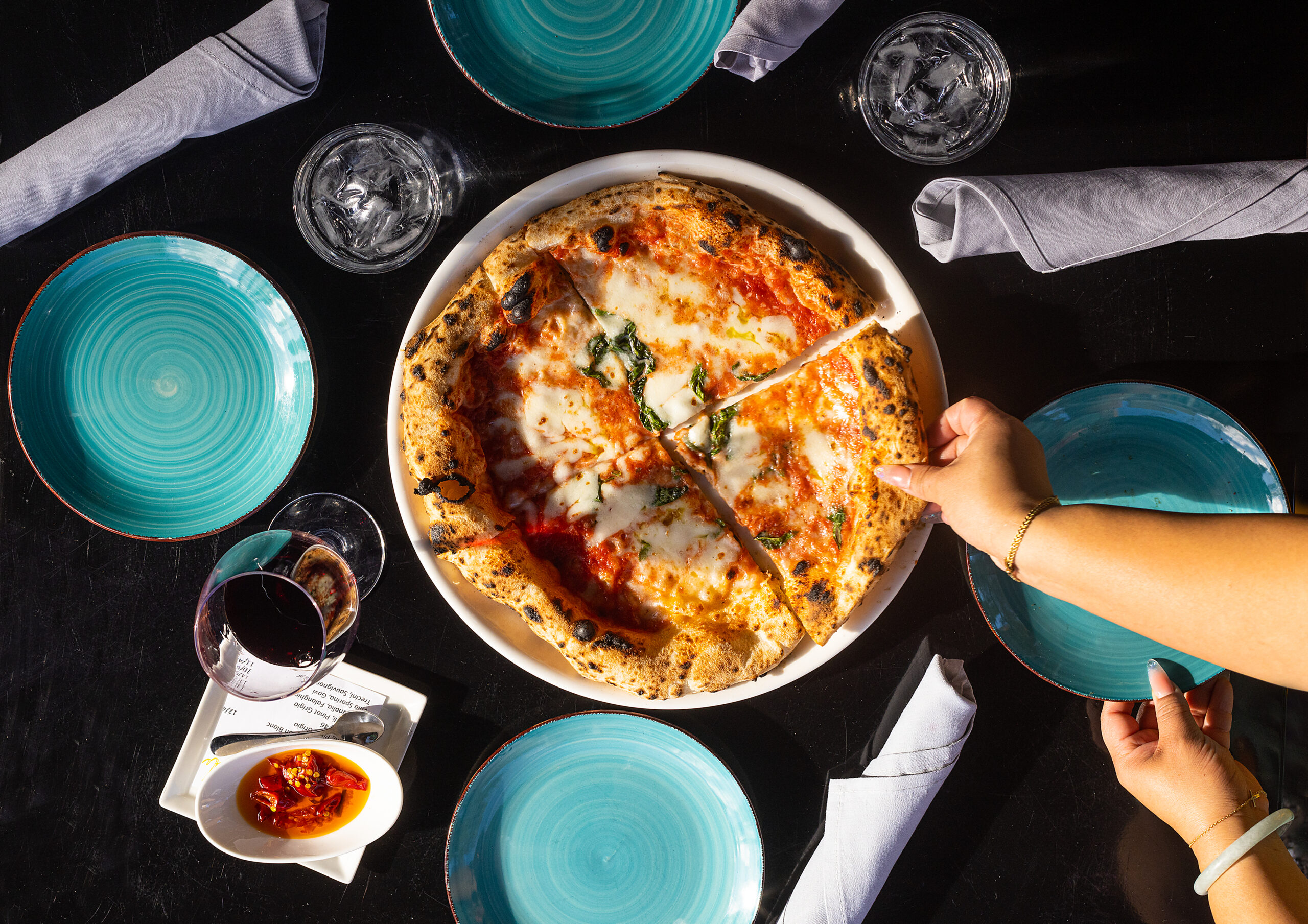 Margherita, the queen of pizzas with sauce of fresh tomatoes, melted mozzarella cheese with fresh basil and EVOO from L'oro di Napoli in downtown Santa Rosa. (John Burgess/The Press Democrat)