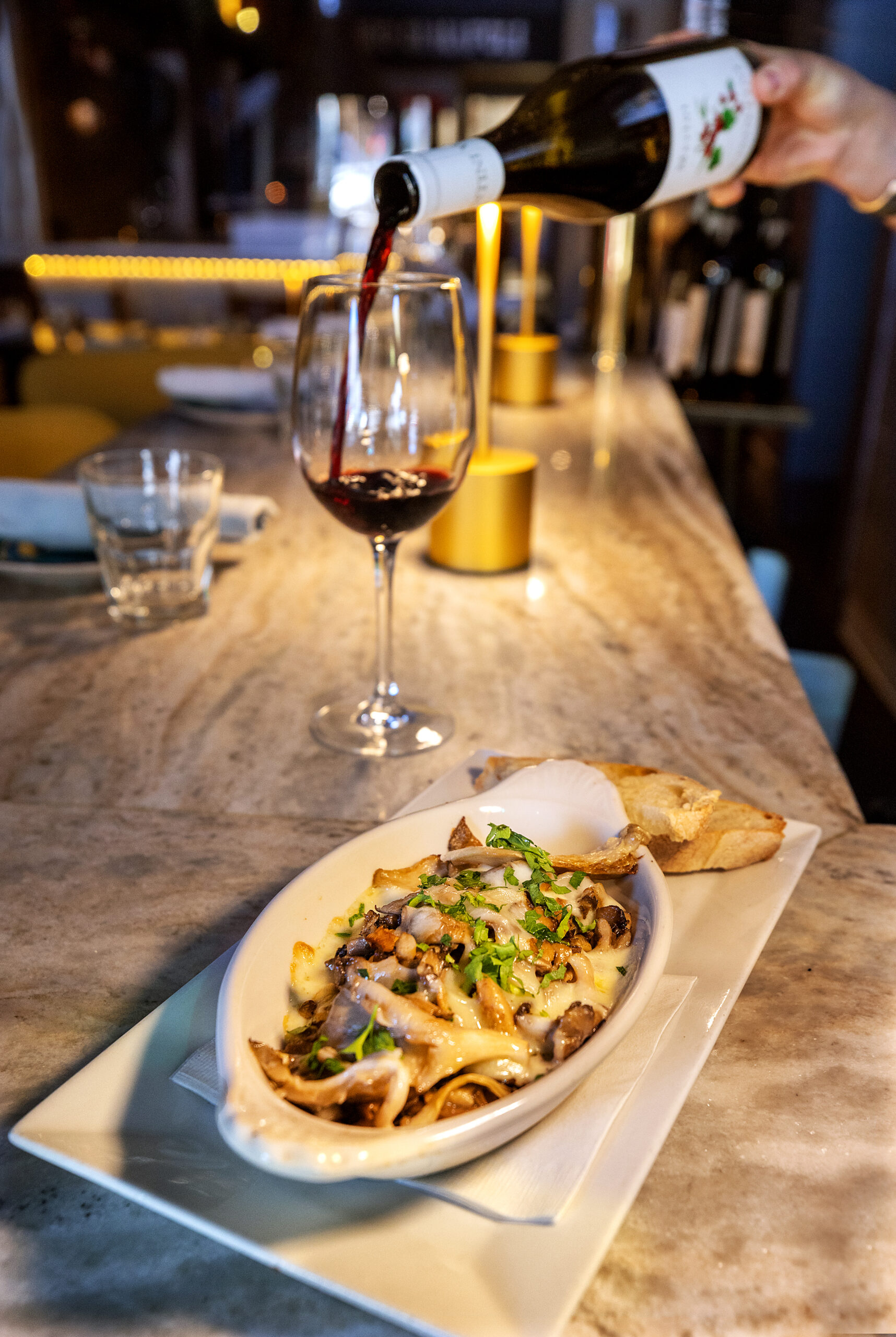 Funghetto Tartufato with melted Scamorza affumicata over sautéed oyster mushrooms topped with parmigiana reggiano and truffle oil from L’oro di Napoli in downtown Santa Rosa March 24, 2023. (John Burgess/The Press Democrat)