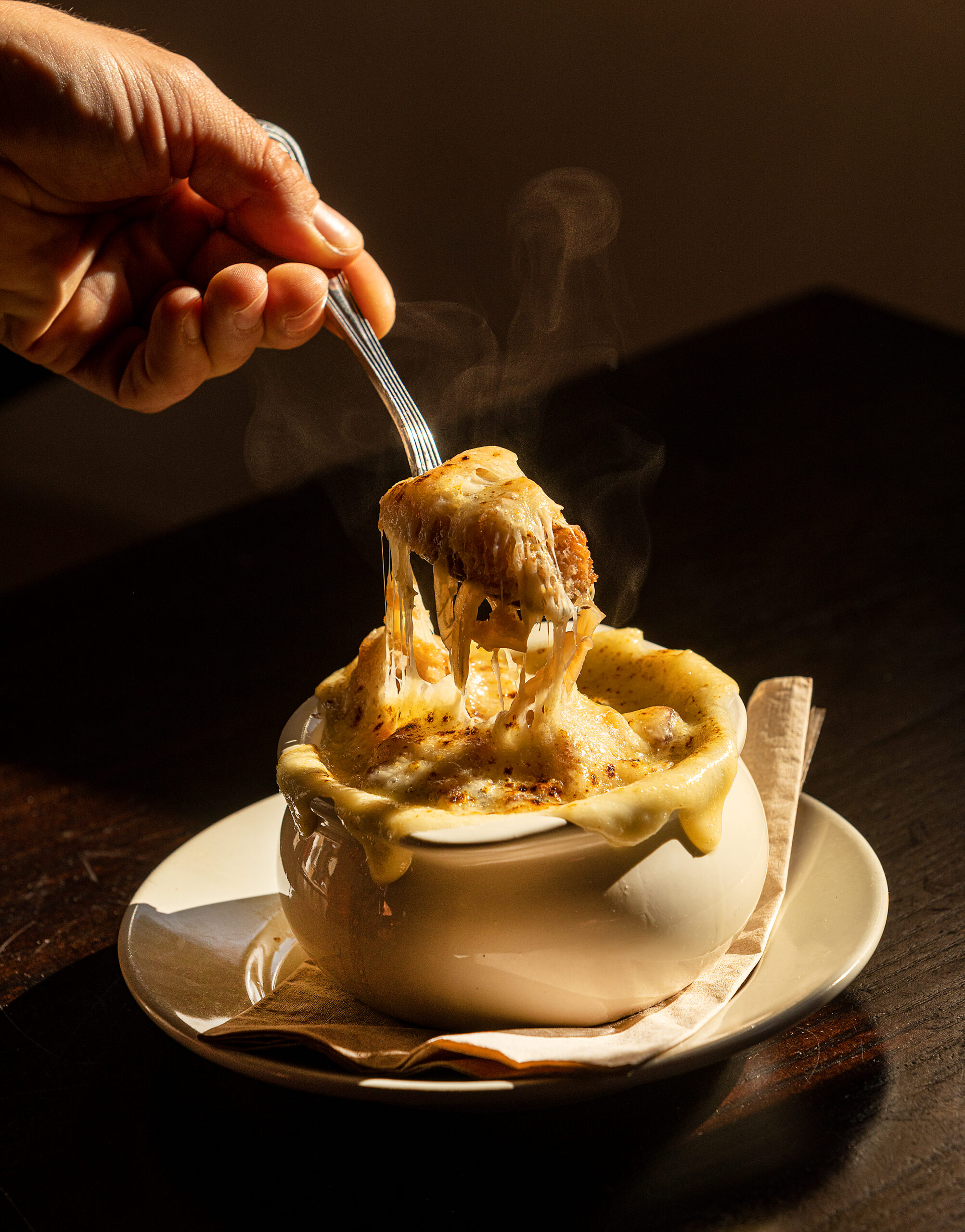 French Onion Soup from the new dinner menu at Americana in Santa Rosa April 13, 2023. (John Burgess/The Press Democrat)