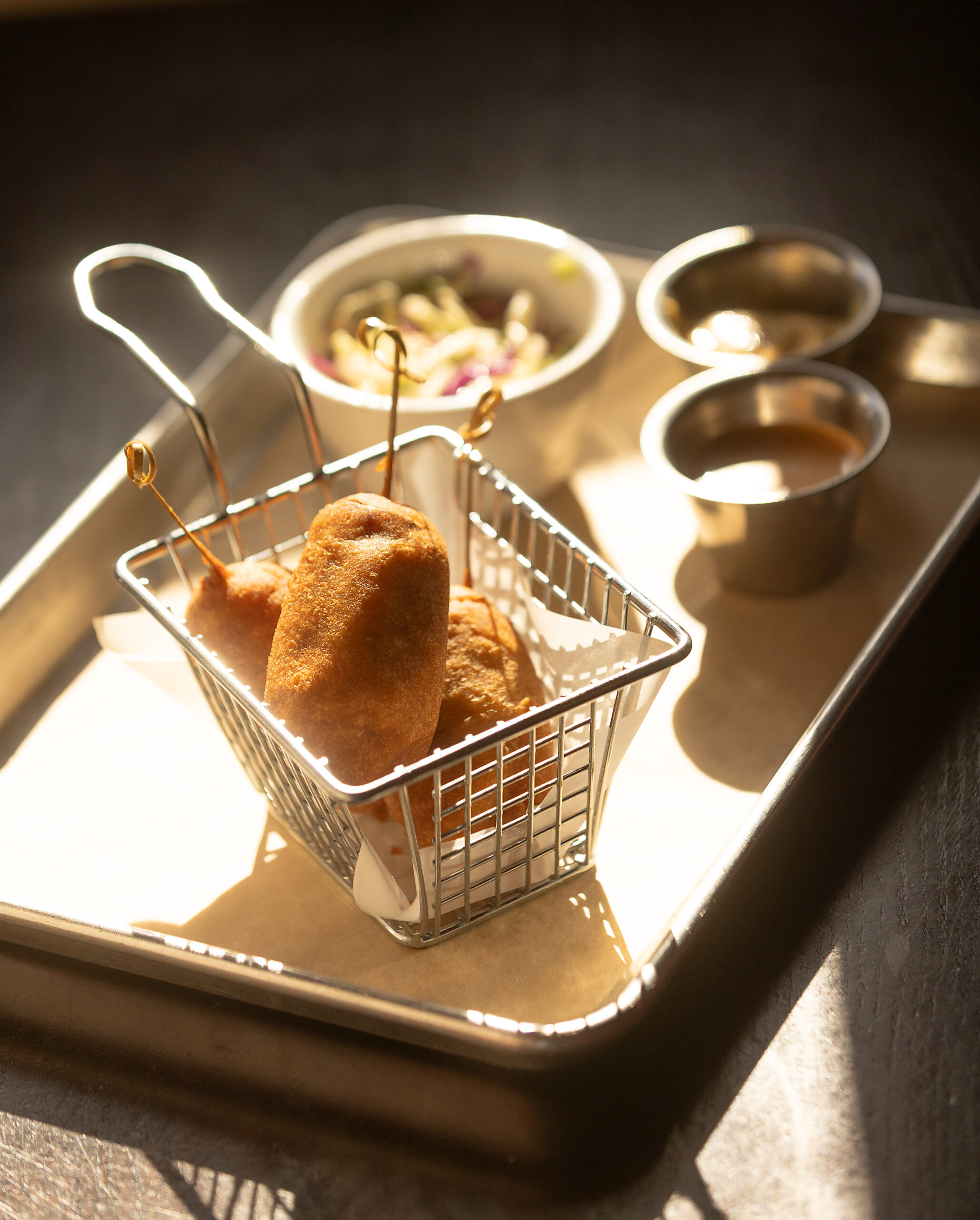 Mini Corn Dog appetizer from the new dinner menu at Americana in Santa Rosa April 13, 2023. (John Burgess/The Press Democrat)