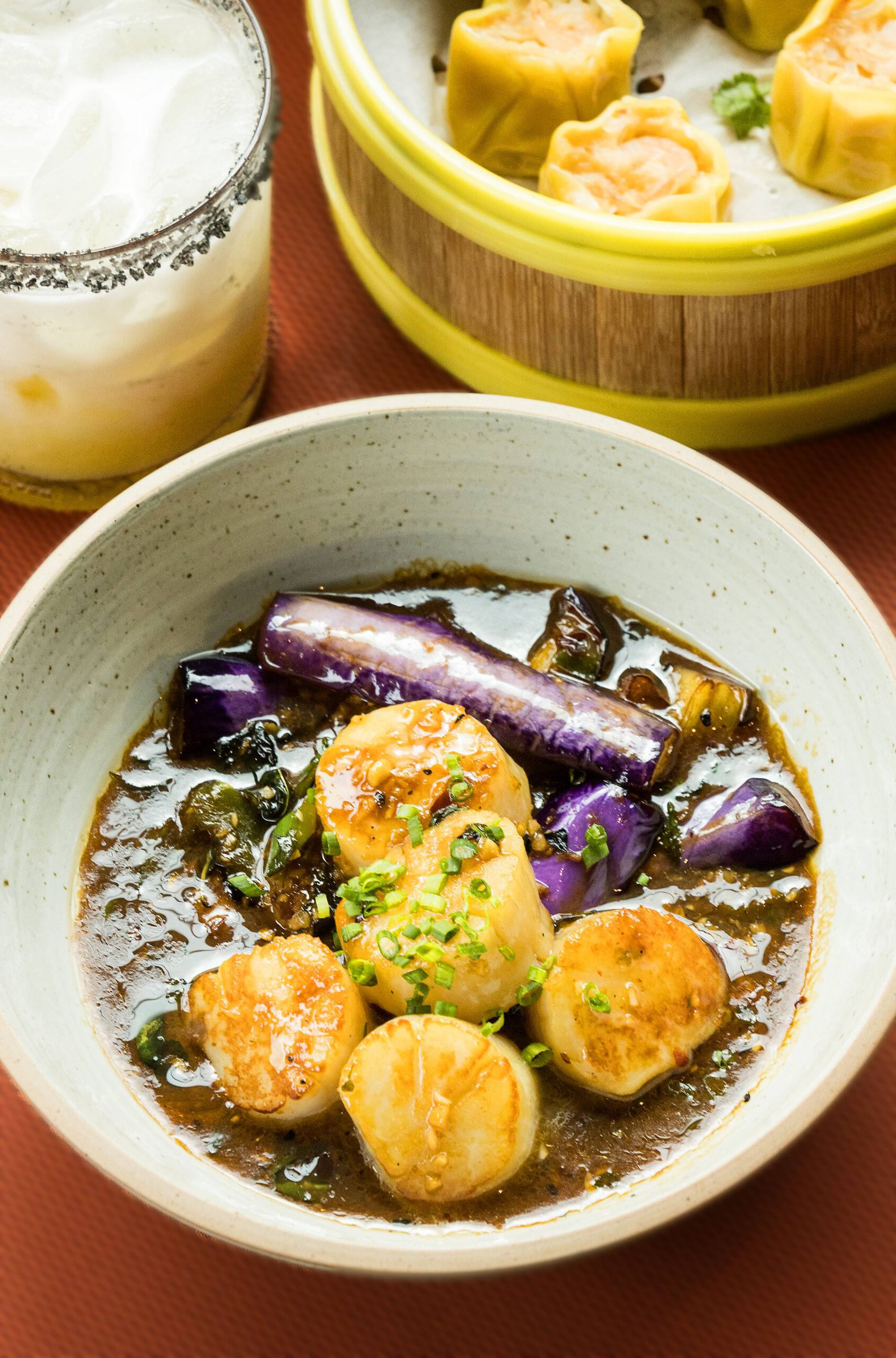 Sautéed Eggplant Sea Scallops with Japanese eggplant, chili, garlic and Thai basil from chef Tony Ounpamornchai’s Mandarin Kitchen in Montgomery Village in Santa Rosa Friday May 5, 2023. (Photo by John Burgess/The Press Democrat)