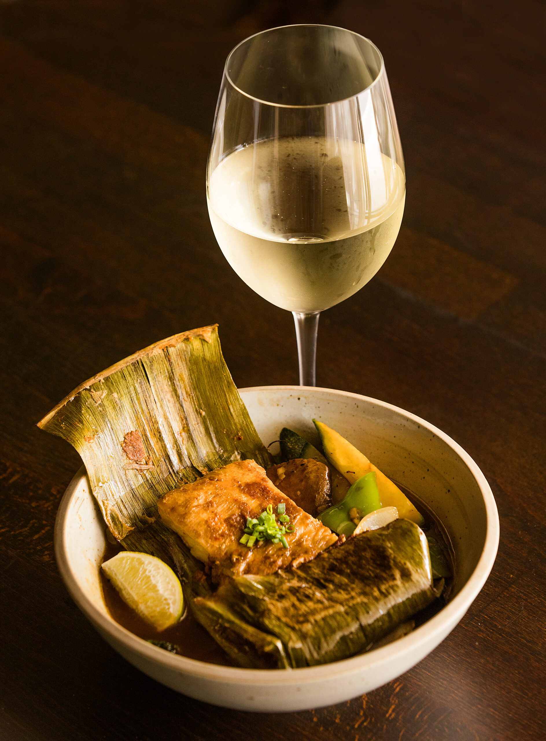 Grilled Sea Bass in Banana Leaves with jungle curry paste and assorted mixed vegetables in black bean sauce ​from chef Tony Ounpamornchai’s Mandarin Kitchen in Montgomery Village in Santa Rosa Friday May 5, 2023. (Photo by John Burgess/The Press Democrat)