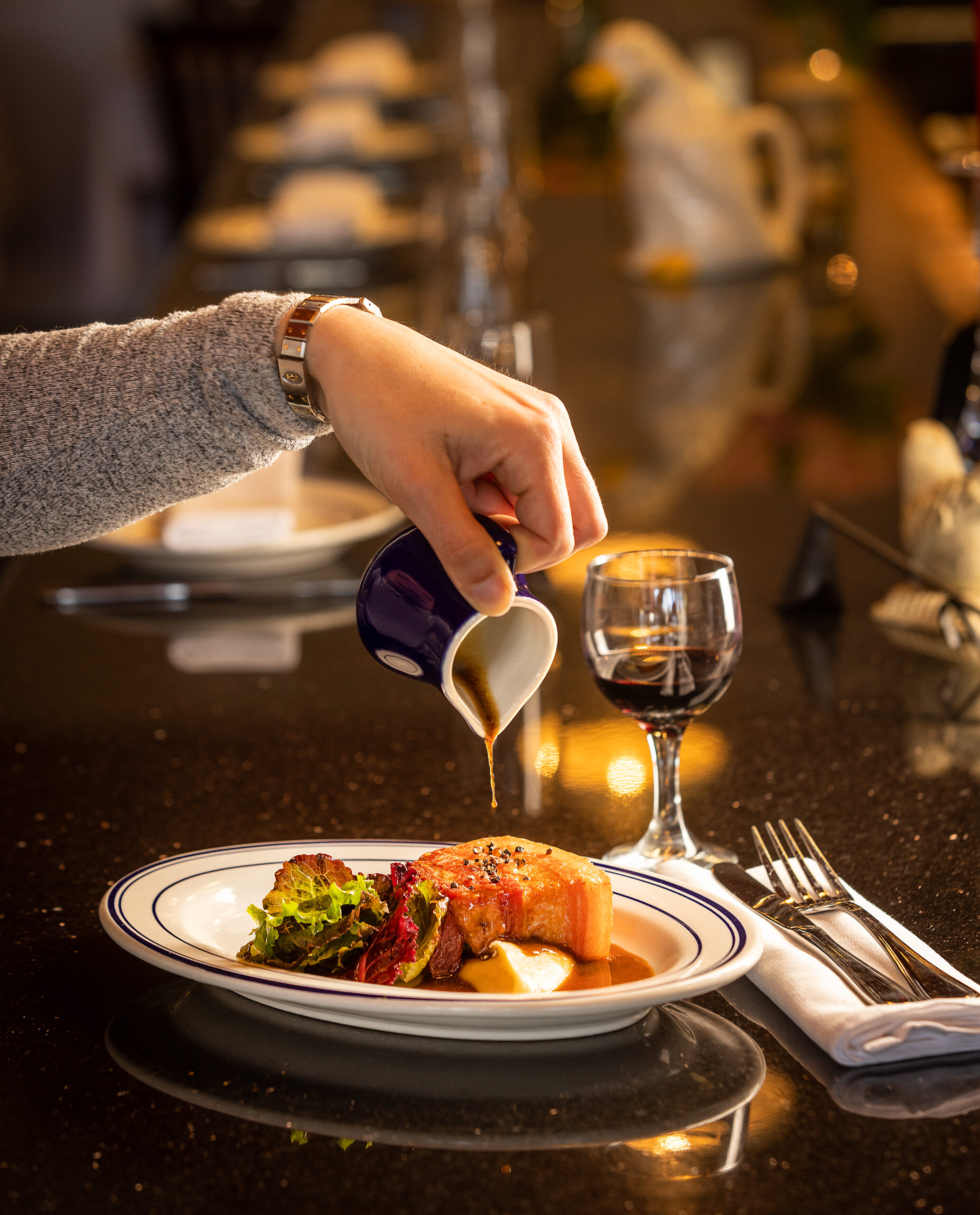 Rillion of pork belly, with Pork Jus and Salsify Pureé from Maison Porcella in Windsor April 13, 2023. (John Burgess/The Press Democrat)