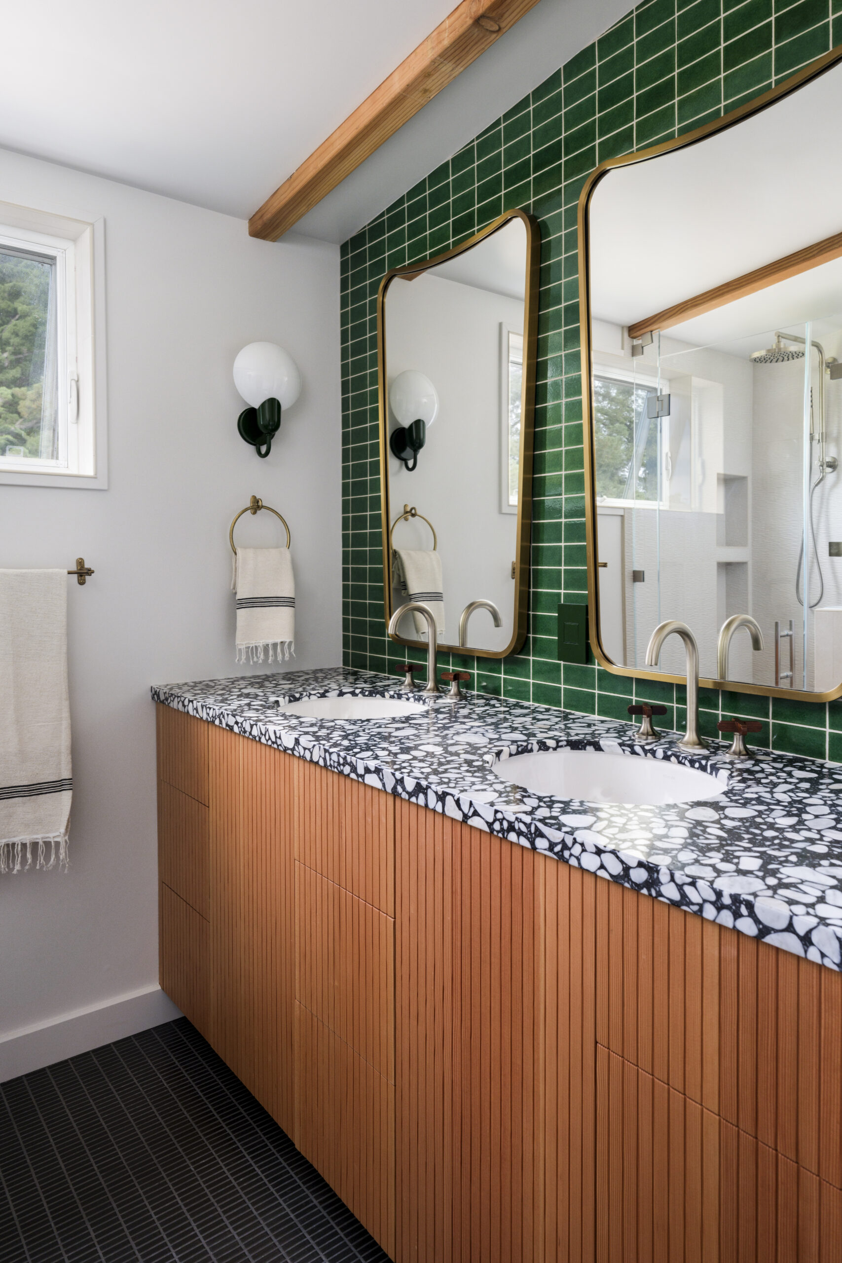 A rich green backsplash provides more drama rooted in a natural vein. (Christopher Stark)