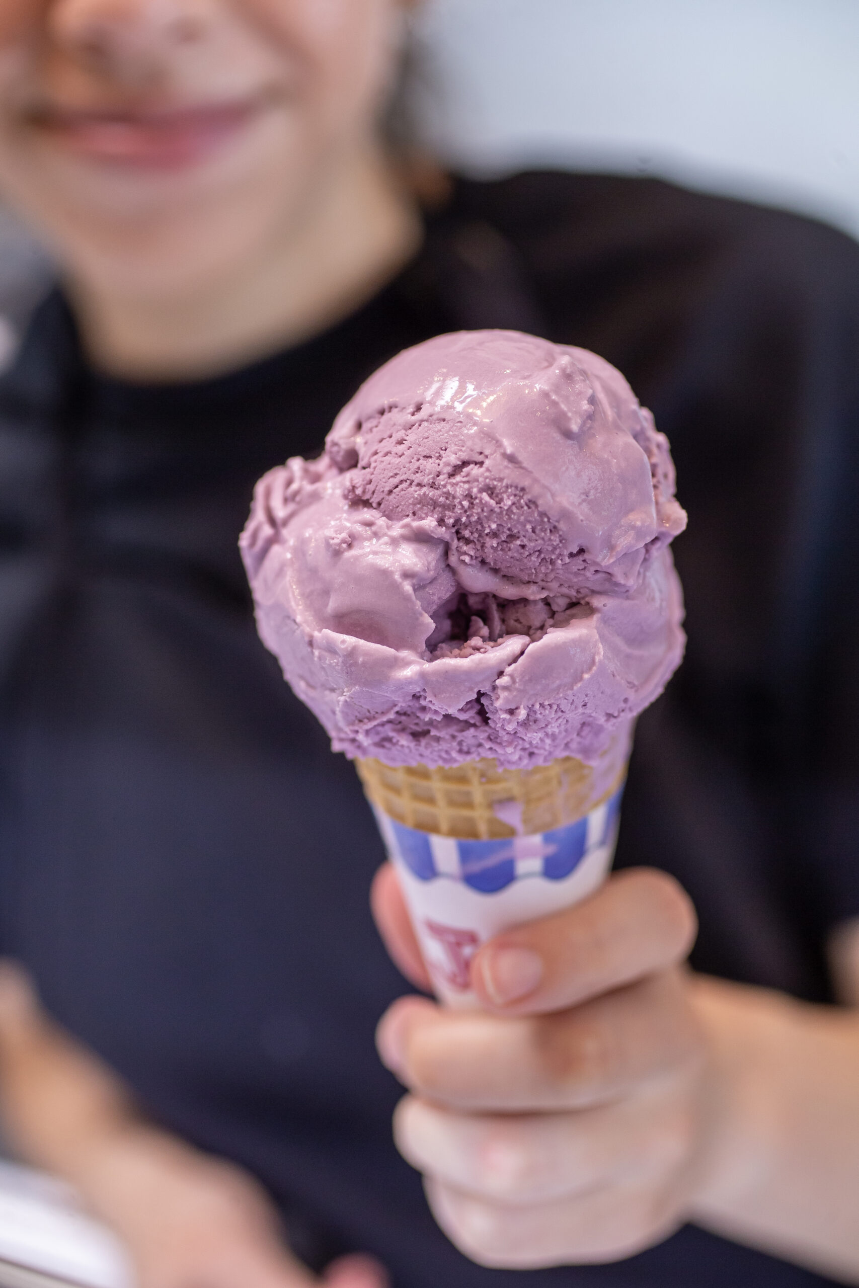 Lavender Angela’s Organic ice cream is served in a sugar cone at Iggy’s Organic Burgers on the plaza, Friday in Downtown Healdsburg June 30, 2023. (Chad Surmick / The Press Democrat)