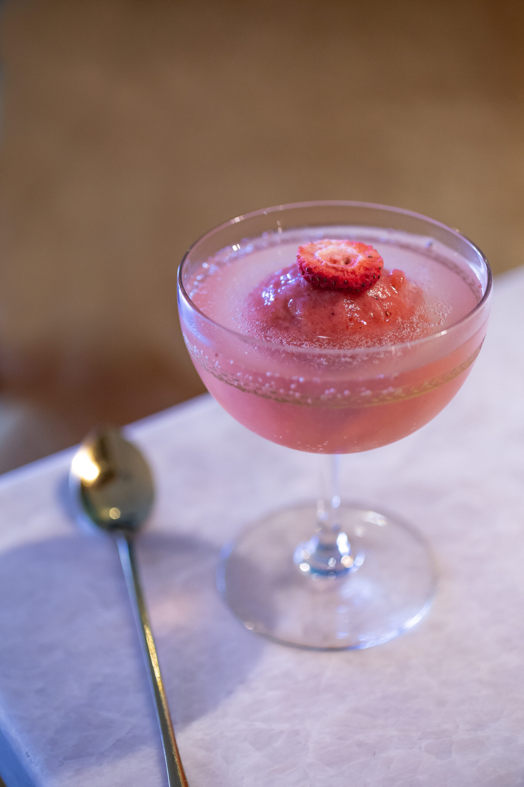 “Strawberry Letter” ice cream cocktail at Nimble and Finn’s. It’s strawberry sorbet with vermouth, elderflower, and champagne, May 18, in Santa Rosa’s Railroad Square (Chad Surmick / The Press Democrat)
