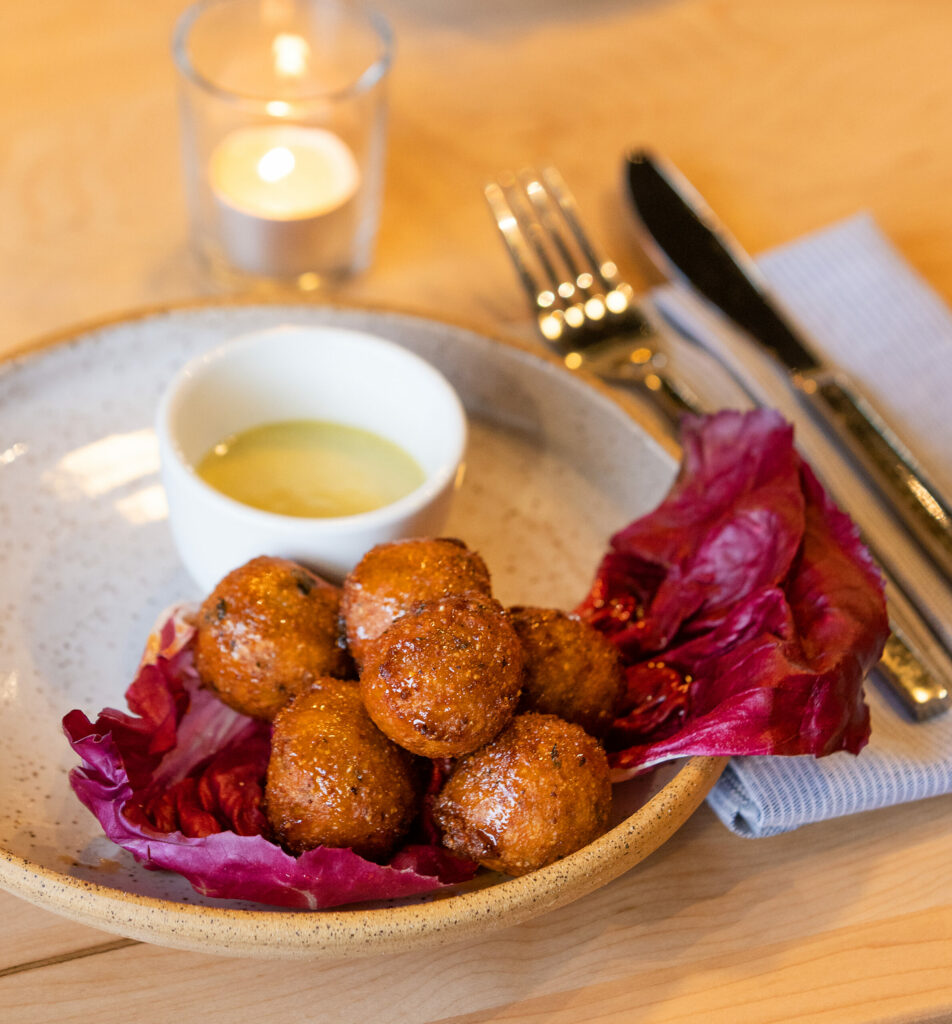 Hushpuppies with roasted apple and remoulade from Luma Bar and Eatery in Petaluma Thursday, February 16, 2023. (John Burgess/The Press Democrat)