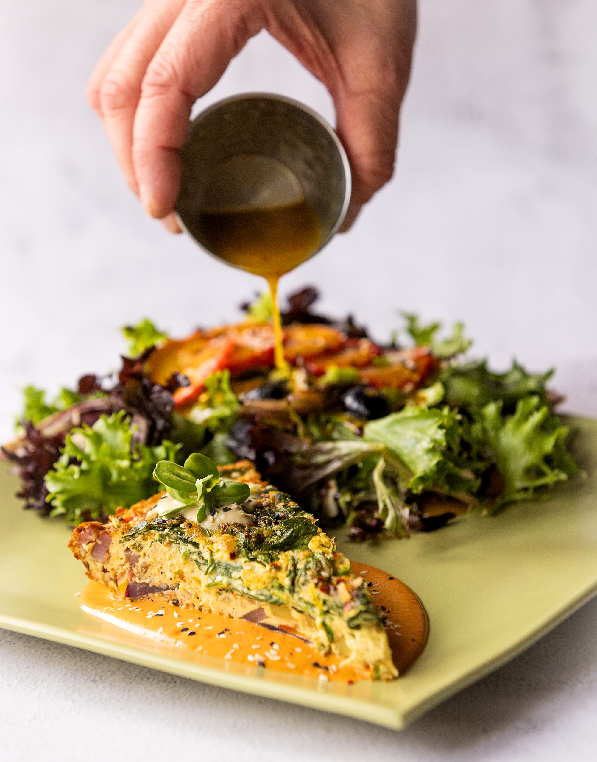 Vegan Frittata with a Cozy Plum Salad with strawberries and blueberries from the Cozy Plum Bistro in Santa Rosa Wednesday, Jan. 18, 2023. (John Burgess/The Press Democrat)