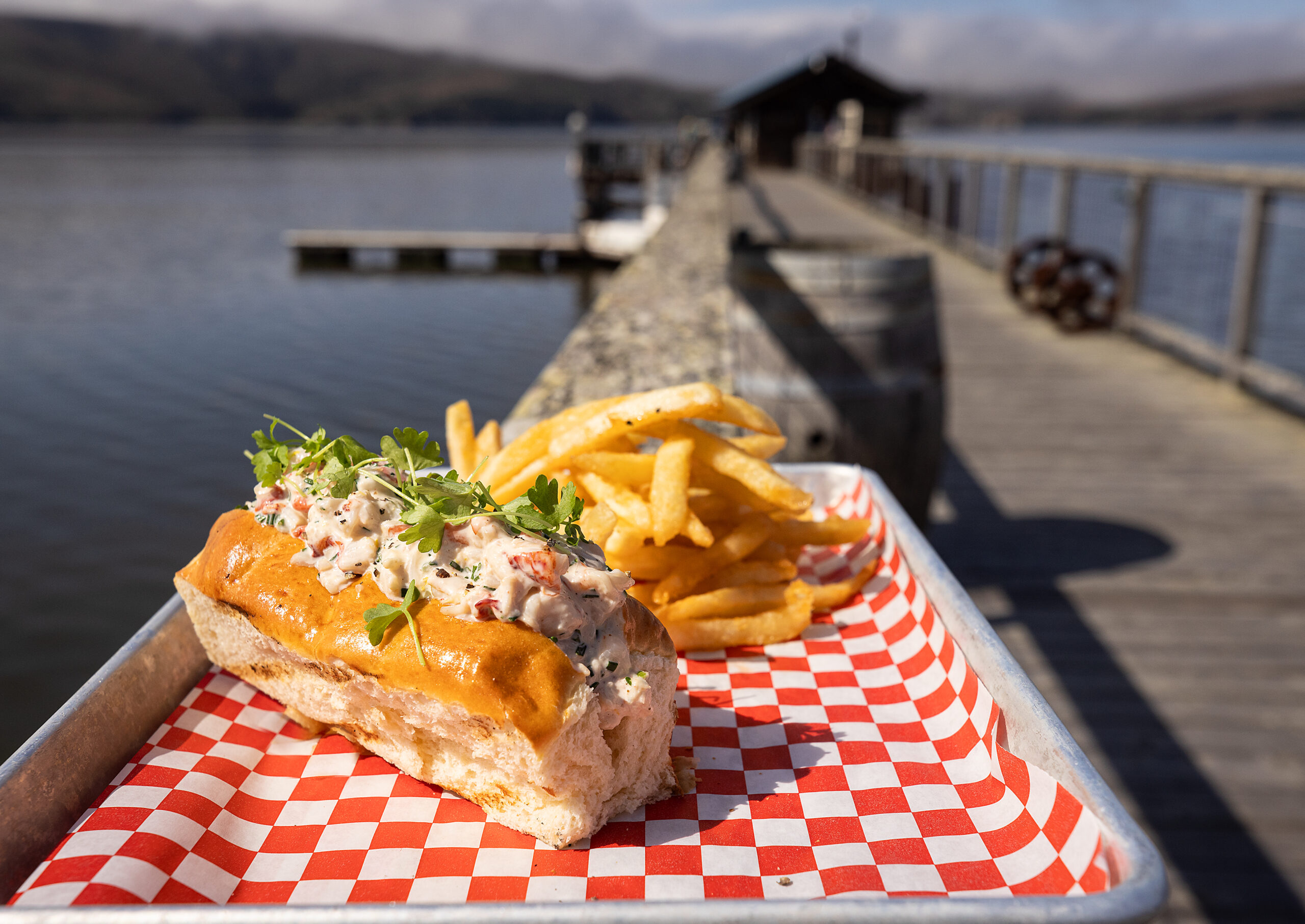 Lobster Roll with mayo, lemon, chives, tarragon and extra crispy fries from Nick’s Cove Restaurant on Tomales Bay Monday, September 18, 2023. (John Burgess/The Press Democrat)