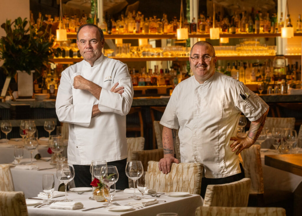 Dry Creek Kitchen owner Charlie Palmer, left, with new chef Shane McAnelly Thursday, November 2, 2023. McAnelly honed his skills at Chalkboard, Brass Rabbit and Bricoleur before creating the new menu on the square in Healdsburg. (Photo John Burgess/The Press Democrat)