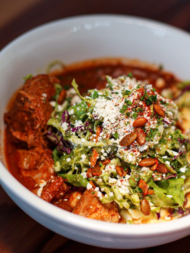 Chile braised Niman pork shoulder atop creamy polenta with fiesta slaw, ricotta salata and crunchy pepitas at Boon Eat + Drink in Guerneville. (Boon Eat + Drink)