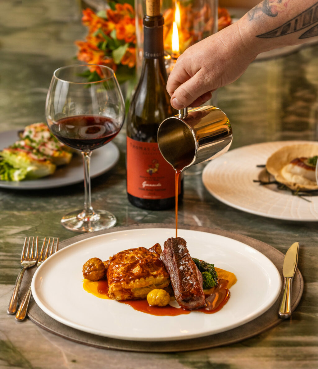 Liberty Farms Duck Breast with leg en croute, koginut squash, roasted chestnuts, rapini and a l’orange jus from the Dry Creek Kitchen Thursday, November 2, 2023 in Healdsburg. (Photo John Burgess/The Press Democrat)