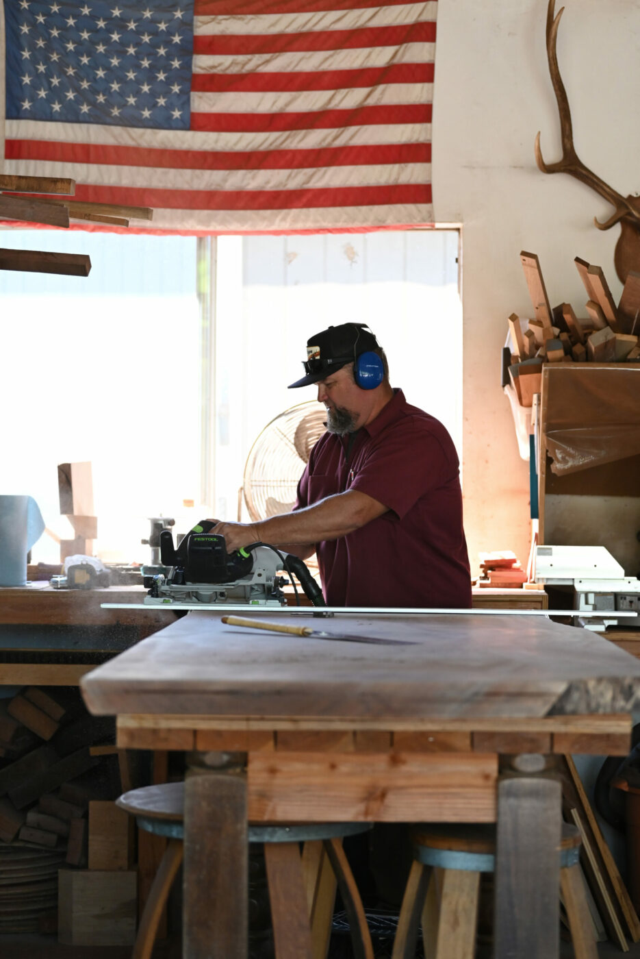 The former heavy-equipment operator started working on wood projects as a child, starting with simple tables and moving on to carved skimboards for his friends. He started selling his designs at farmers markets in 2011.