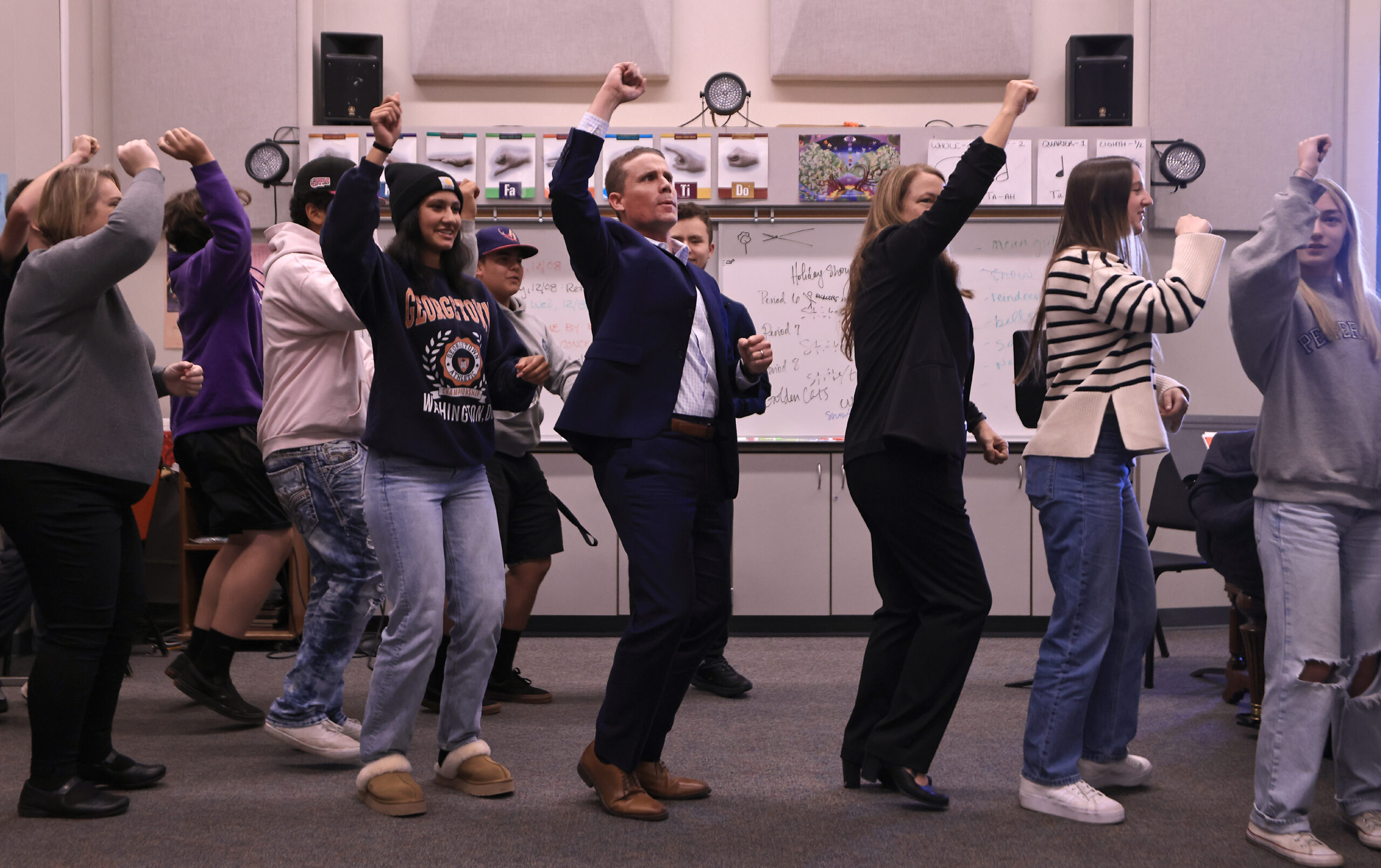As he wraps up a speaking engagement with the Ukiah High School Associated Student Body organization, Mike McGuire, California State Majority Leader teaches the group a dance, Wednesday, Nov. 8, 2023. (Kent Porter / The Press Democrat) 2023
