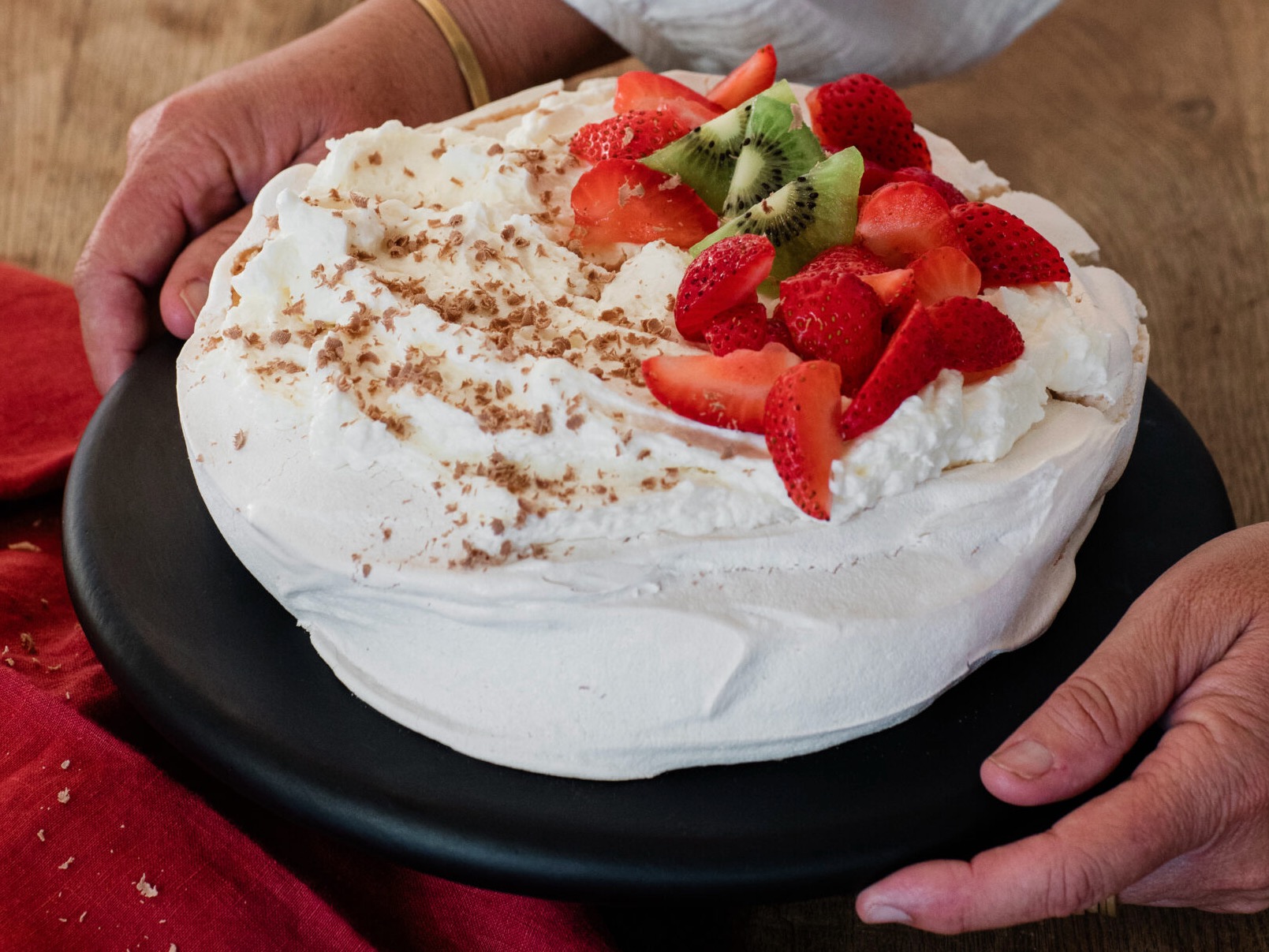 New Zealand-style Pavlova from BurtoNZ Bakery in Windsor. (Photo by Eileen Roche. Styling by Alysia Andriola / for Sonoma Magazine)