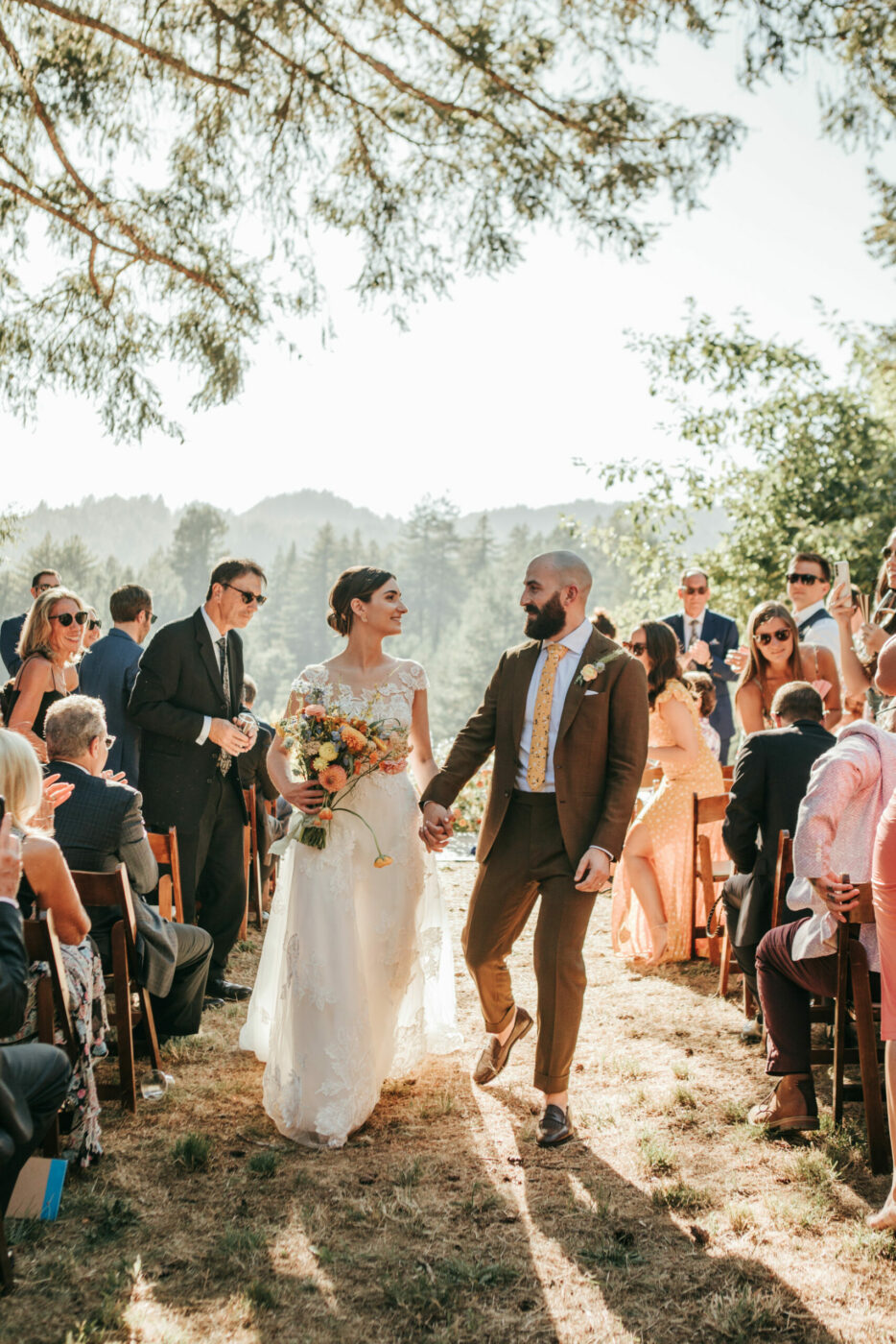 At The Stavrand, Kate found inspiration for her dress, with its delicate leaf embroidery, and for her flowers, which took their palette from the hotel’s colorful, hand-painted Talavera tile. (Annamae Photo)