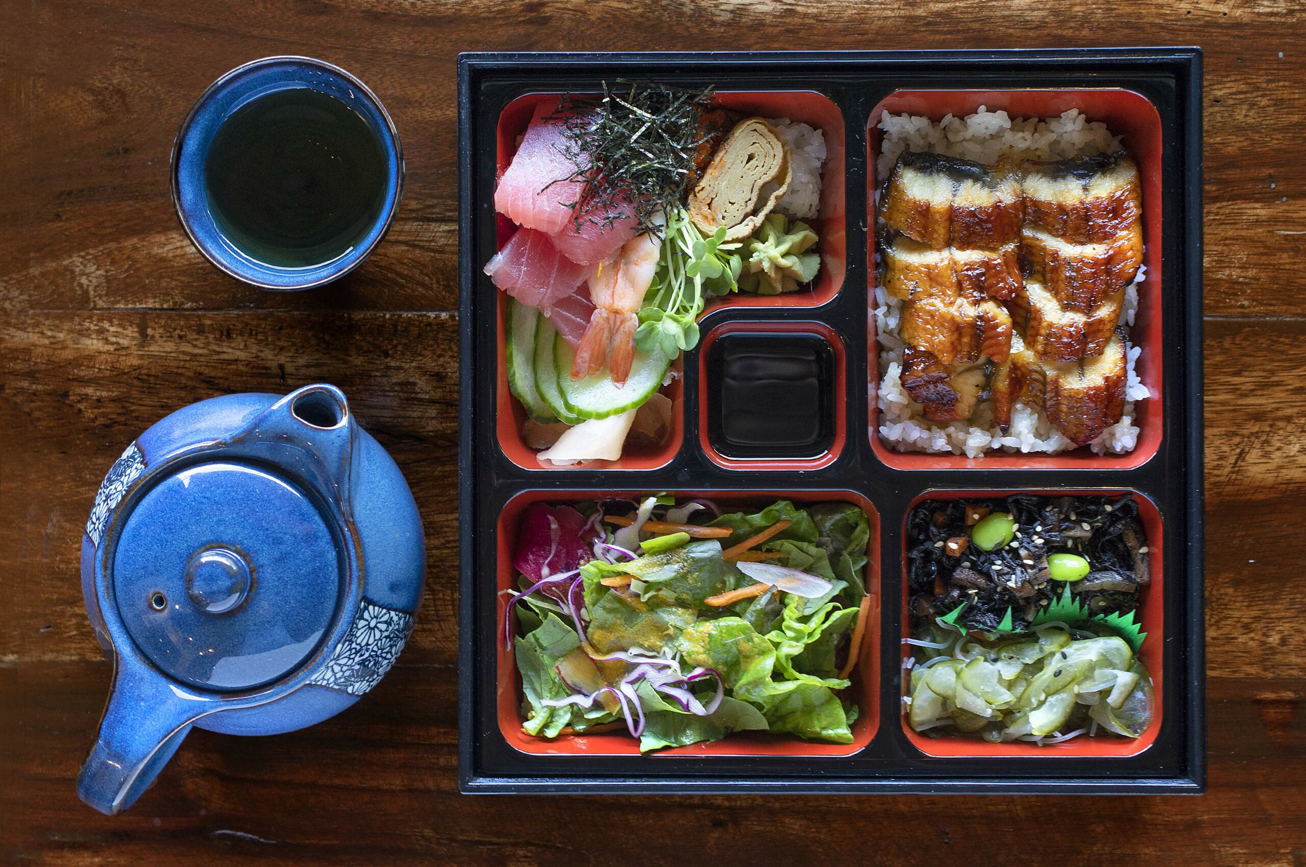 Classic bento box with chirashi, grilled unagi, two Japanese salads and a garden salad from Taste of Tea in Healdsburg. (John Burgess / The Press Democrat)