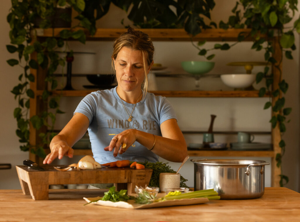 Laci Sandoval, owner of Wind & Rye Kitchen culinary workshops uses the back from a spatchcocked fresh turkey to make her stock three days in advance of Thanksgiving. Sandoval works in the teaching kitchen Monday, November 6, 2023 in Penngrove. (Photo John Burgess/The Press Democrat)